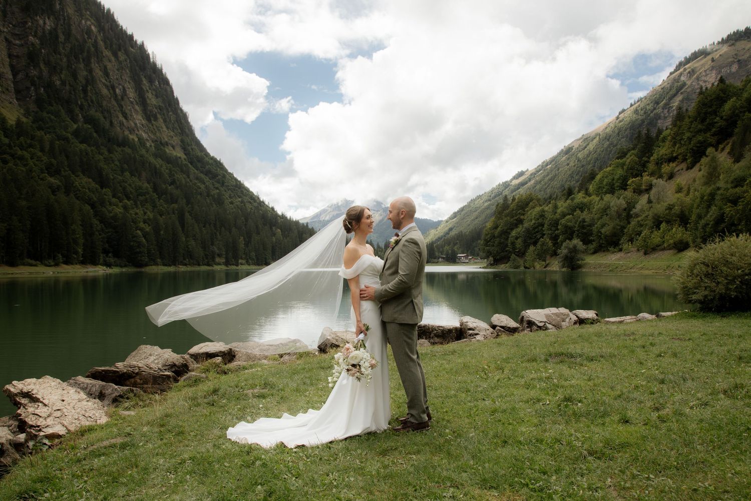 Morzine Wedding photographer captures intimate wedding cermeony photos on Lac Montriond. Candid timeless documentary style photography.