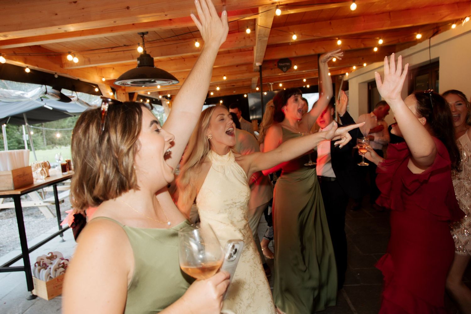 Morzine Wedding photographer captures flash photos of wedding party at Montriond Wedding Venue, Lake Montriond.Candid timeless documentary.