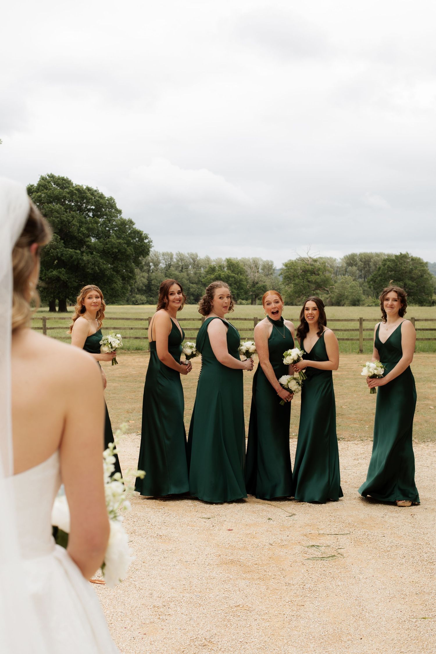 Candid Cotswold Wedding Photographer captures bridal party at Gloucestershire Wedding Venue. Natural, candid and timeless photography, UK