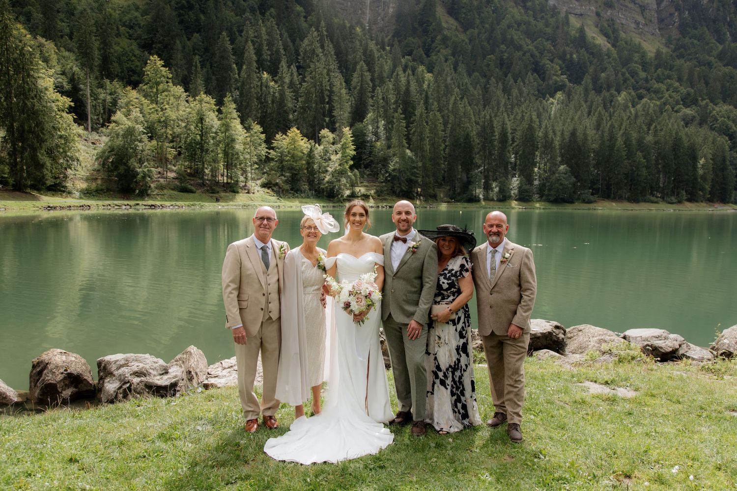 Morzine Wedding photographer captures intimate wedding cermeony photos on Lac Montriond. Candid timeless documentary style photography.