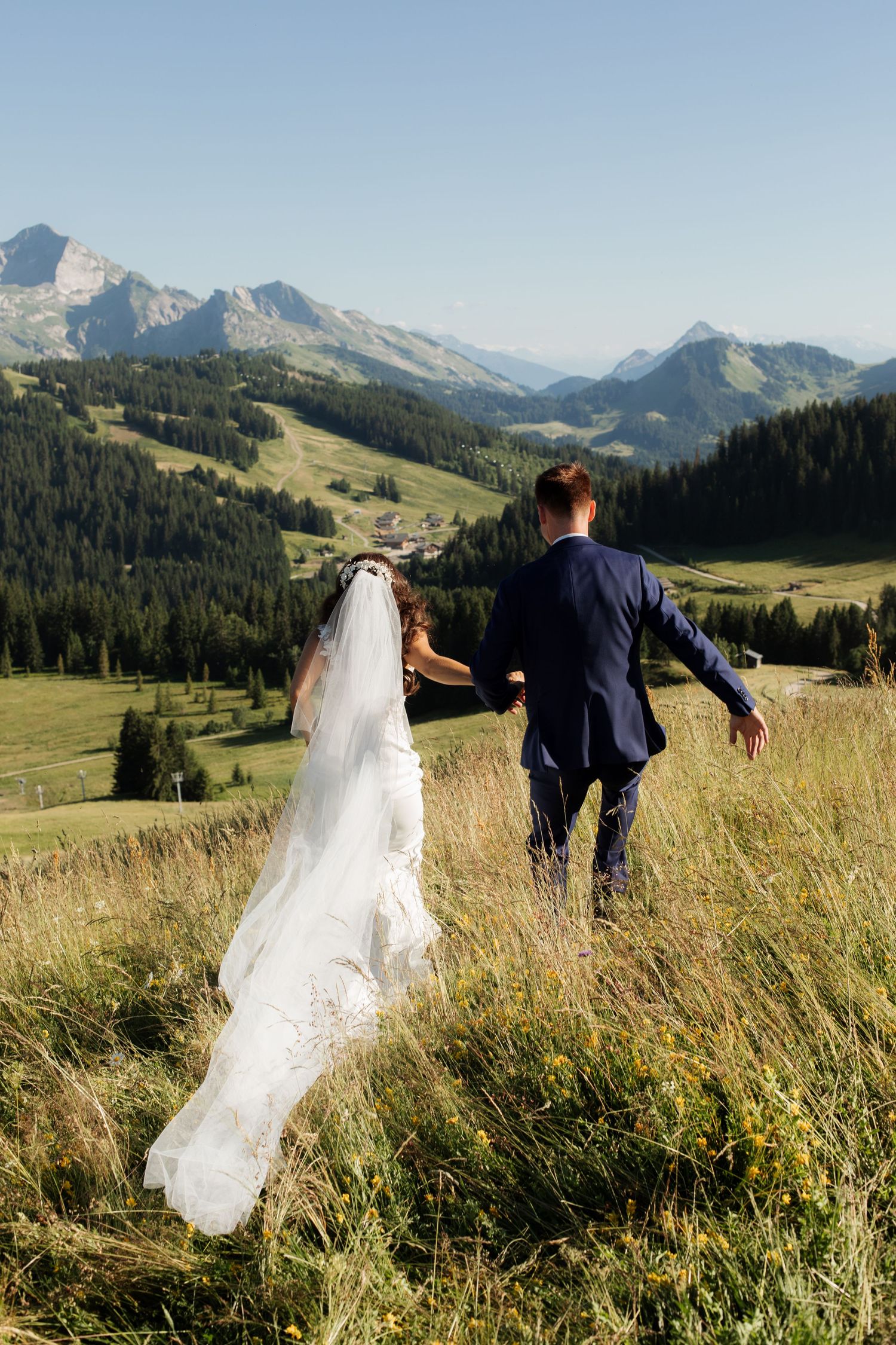 Morzine Wedding Photographer captures bride and groom photos in La Clusaz Wedding venue. French Mountain Wedding photographer. Outdoor Bride