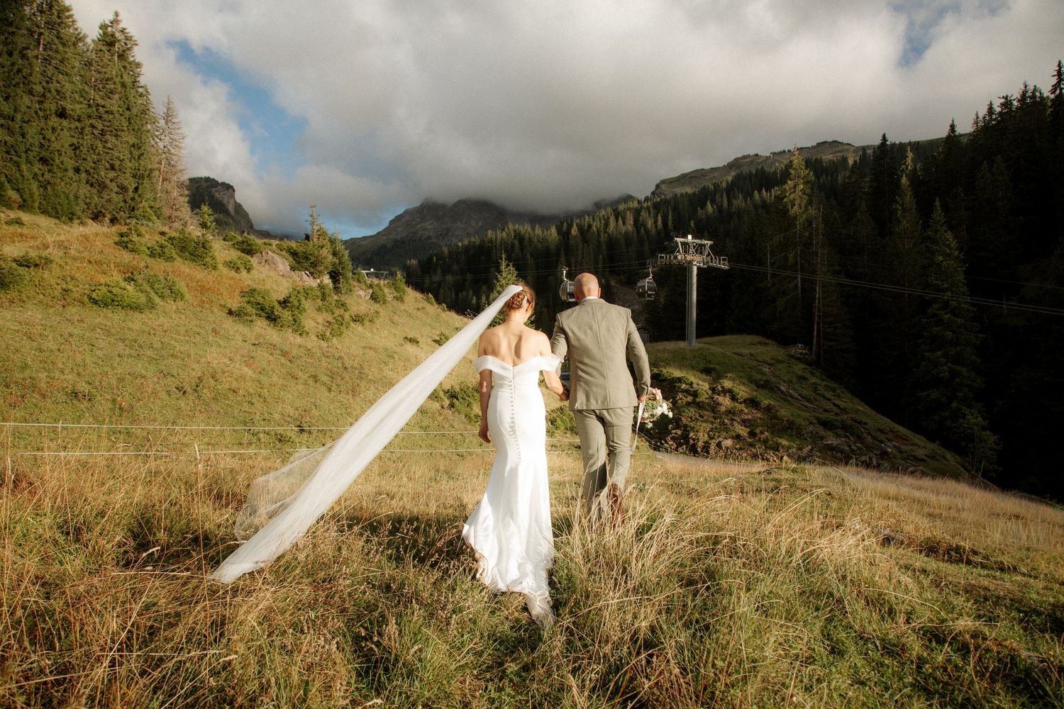 wedding photographer and elopement photographer capture a couple at their mountain wedding in the french Alps. Mountain wedding venue