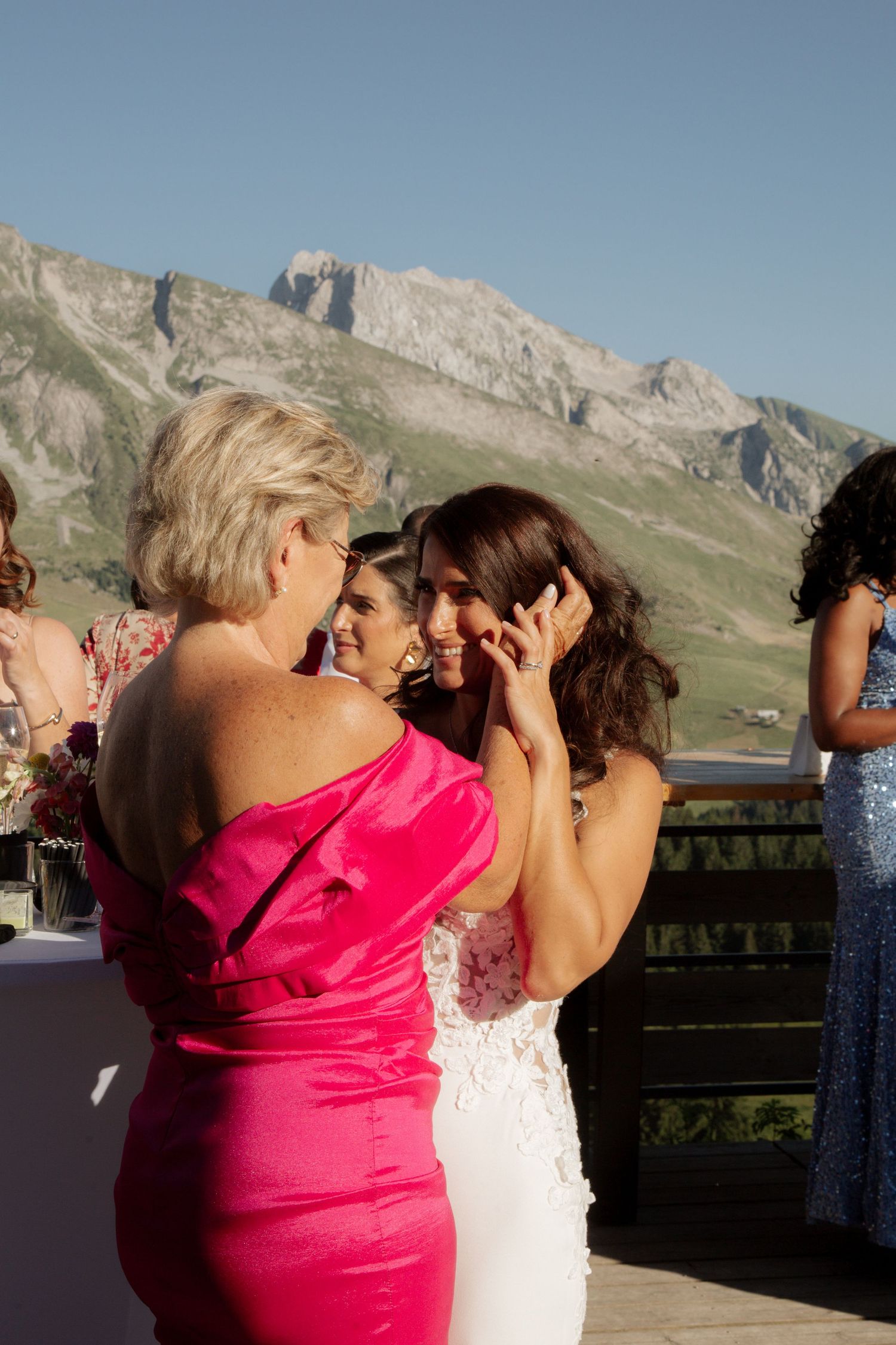 Morzine Wedding Photographer captures epic sunset wedding dinner in La Clusaz Wedding venue. French Alps, Mountain Wedding photographer.