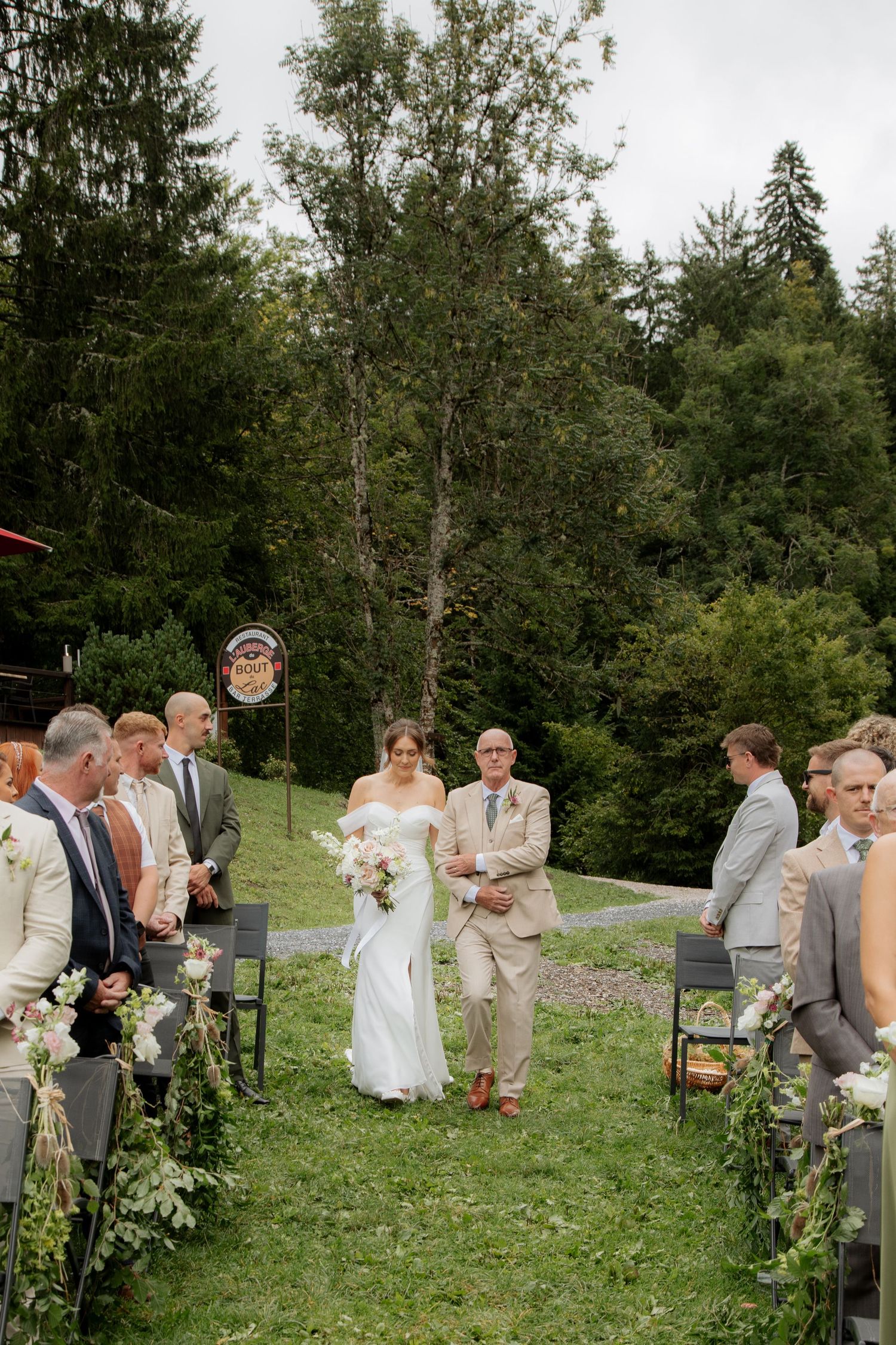 Morzine Wedding photographer captures outdoor wedding cermeony photo on Lac Montriond. Candid timeless documentary style photography.