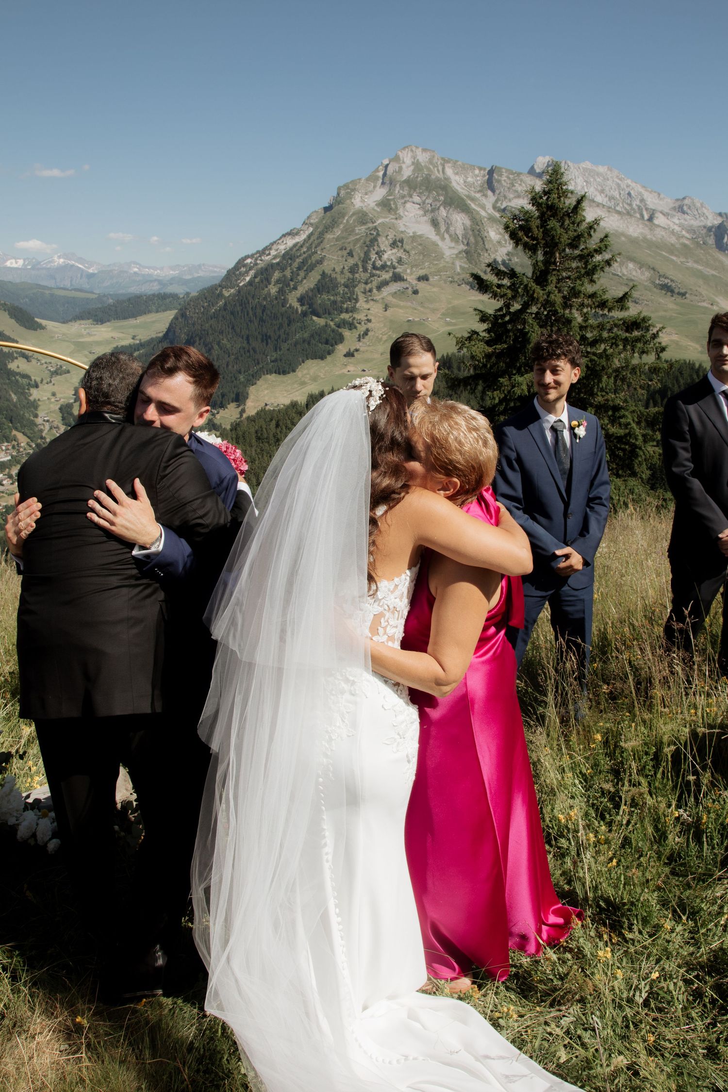 European Wedding Photographer captures emotional wedding at La Clusaz Wedding venue. French Alps Mountain Wedding photographer.Outdoor Bride