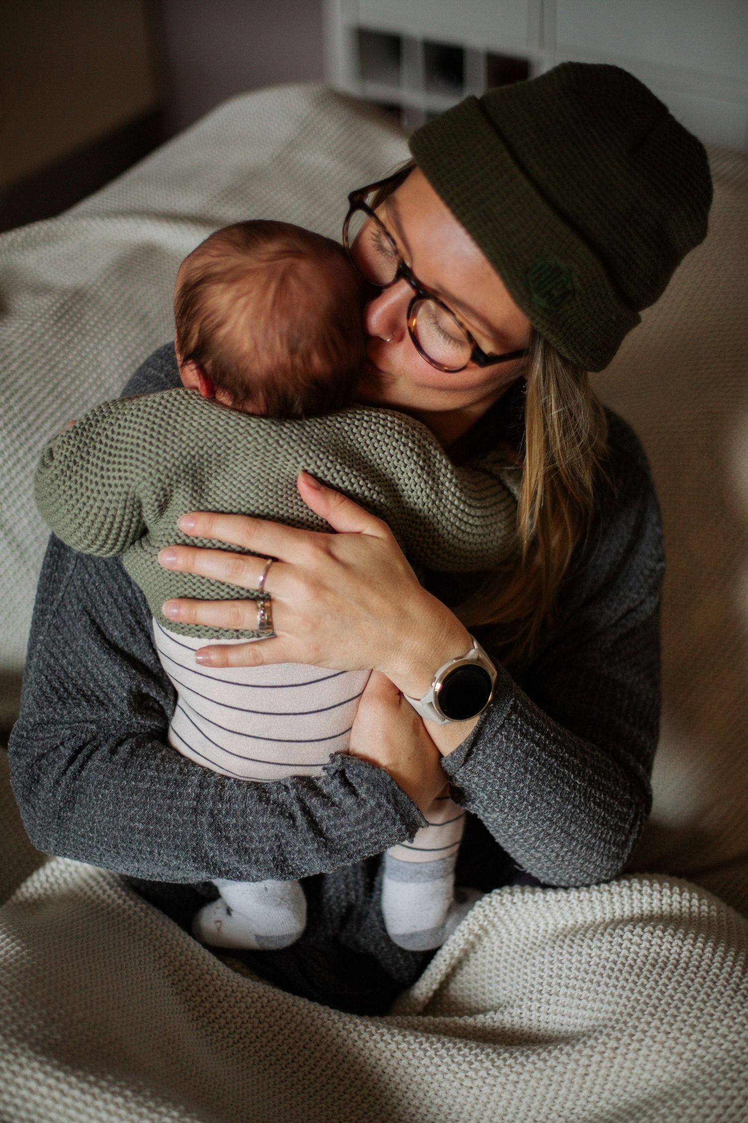 Newborn Photographer captures maternity photos of mother and baby. Newborn photography session captured by Morzine newborn Photographer