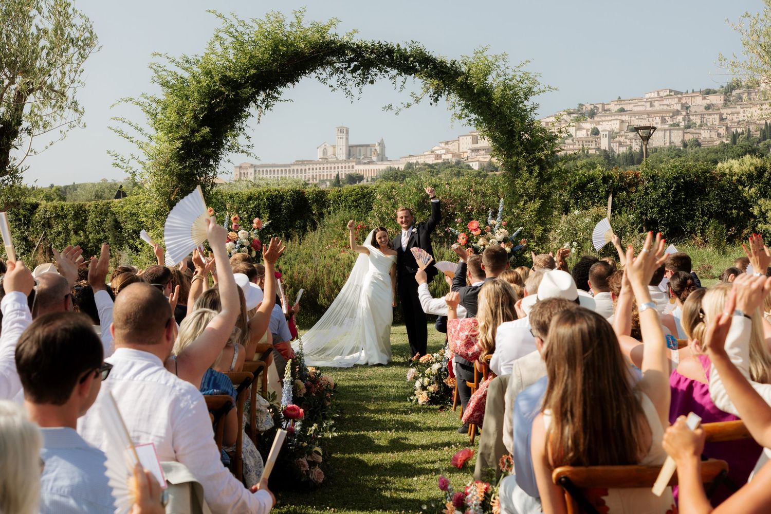 Italian Wedding photos in Assisi captured by destination wedding photographer, candid, natural style. Documentary style wedding photography.