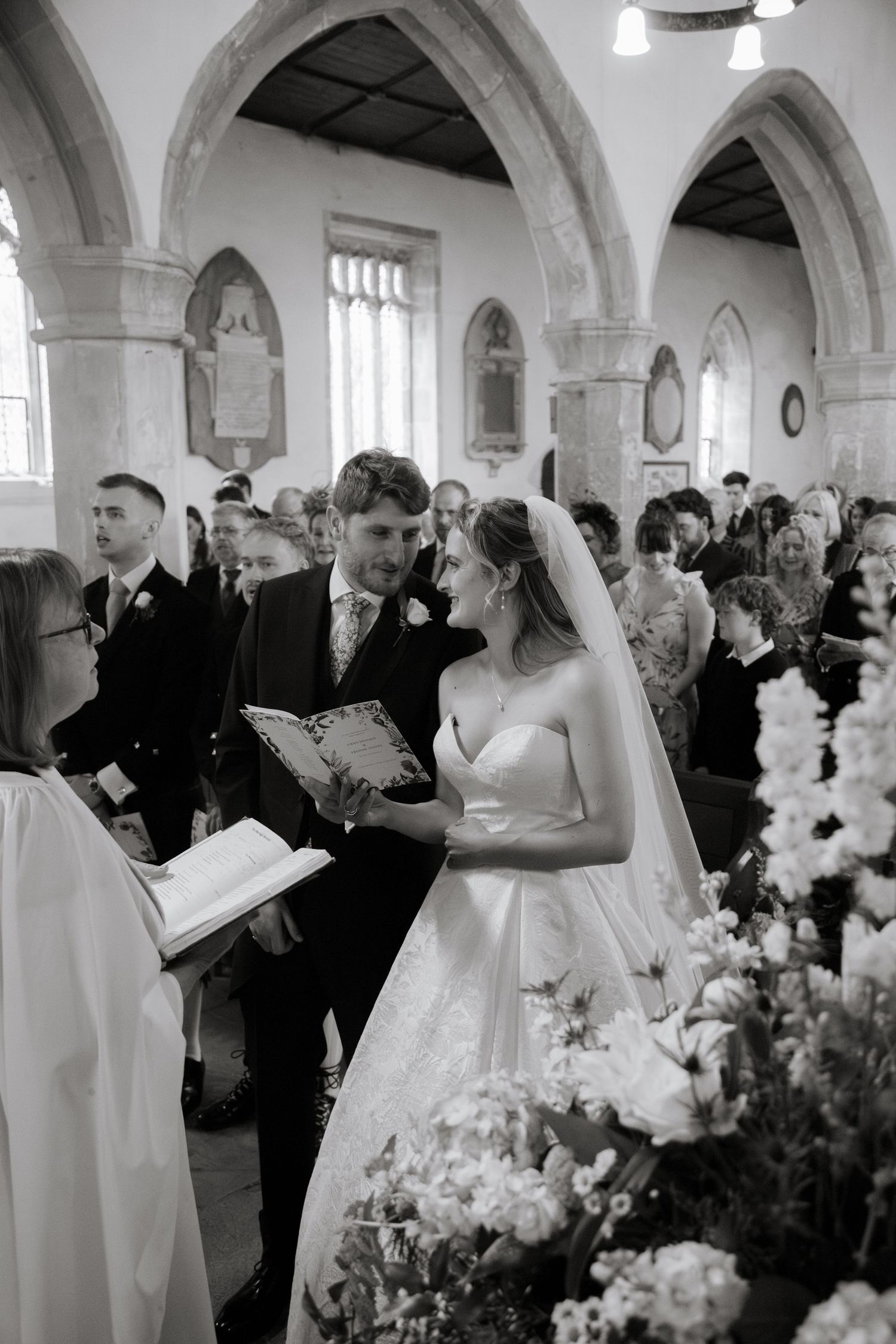 Documentary Style Cotswold Wedding Photographer captures wedding confetti at Gloucestershire Wedding Venue.Natural,candid and timeless photo
