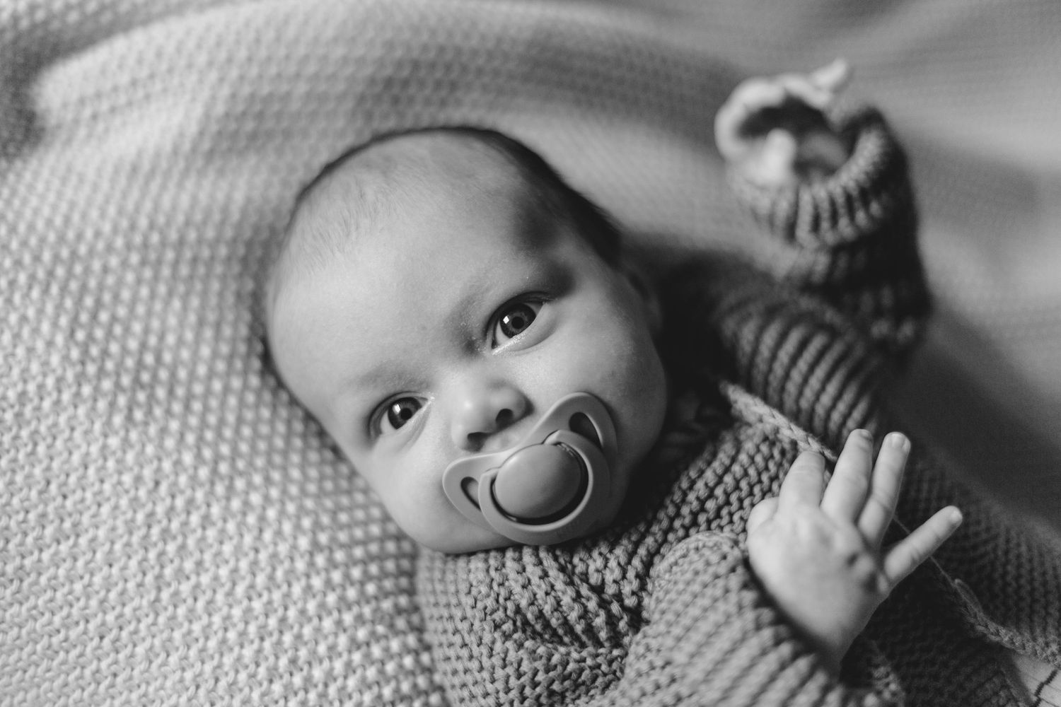 Newborn Photographer captures maternity photos of mother and baby. Newborn photography session captured by Morzine newborn Photographer