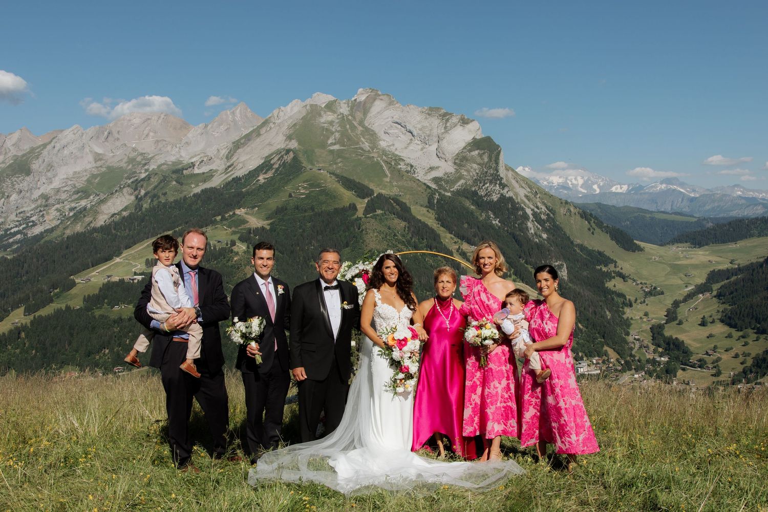 Morzine Wedding Photographer captures wedding ceremony photo at La Clusaz Wedding venue. French Mountain Wedding photographer. Outdoor Bride
