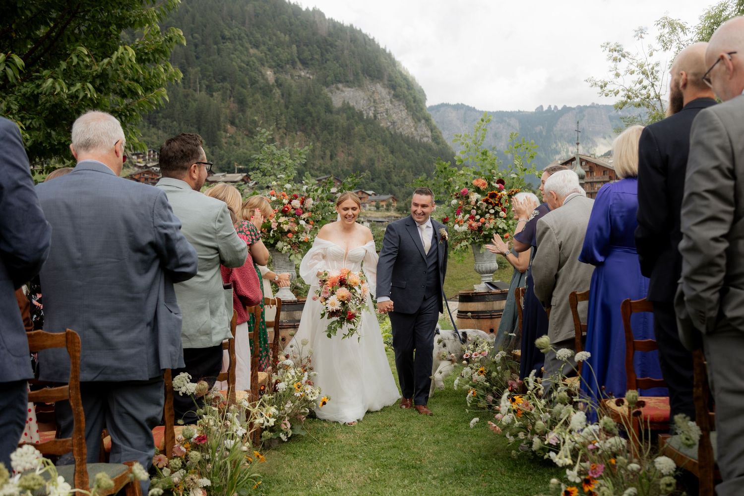 Morzine Wedding photographer captures epic confetti and real emotions in Morzine Wedding Venue. Candid,timeless documentary style photos