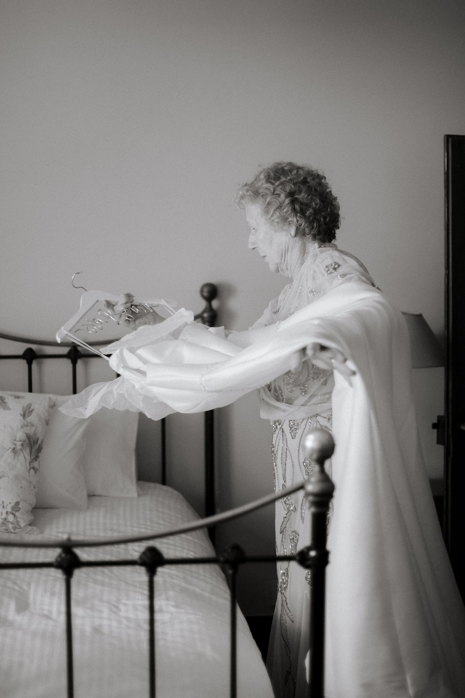 mother of the bride on teh morning of a wedding at a french wedding venue. Cpatured by Morzine wedding photographer. Destination wedding