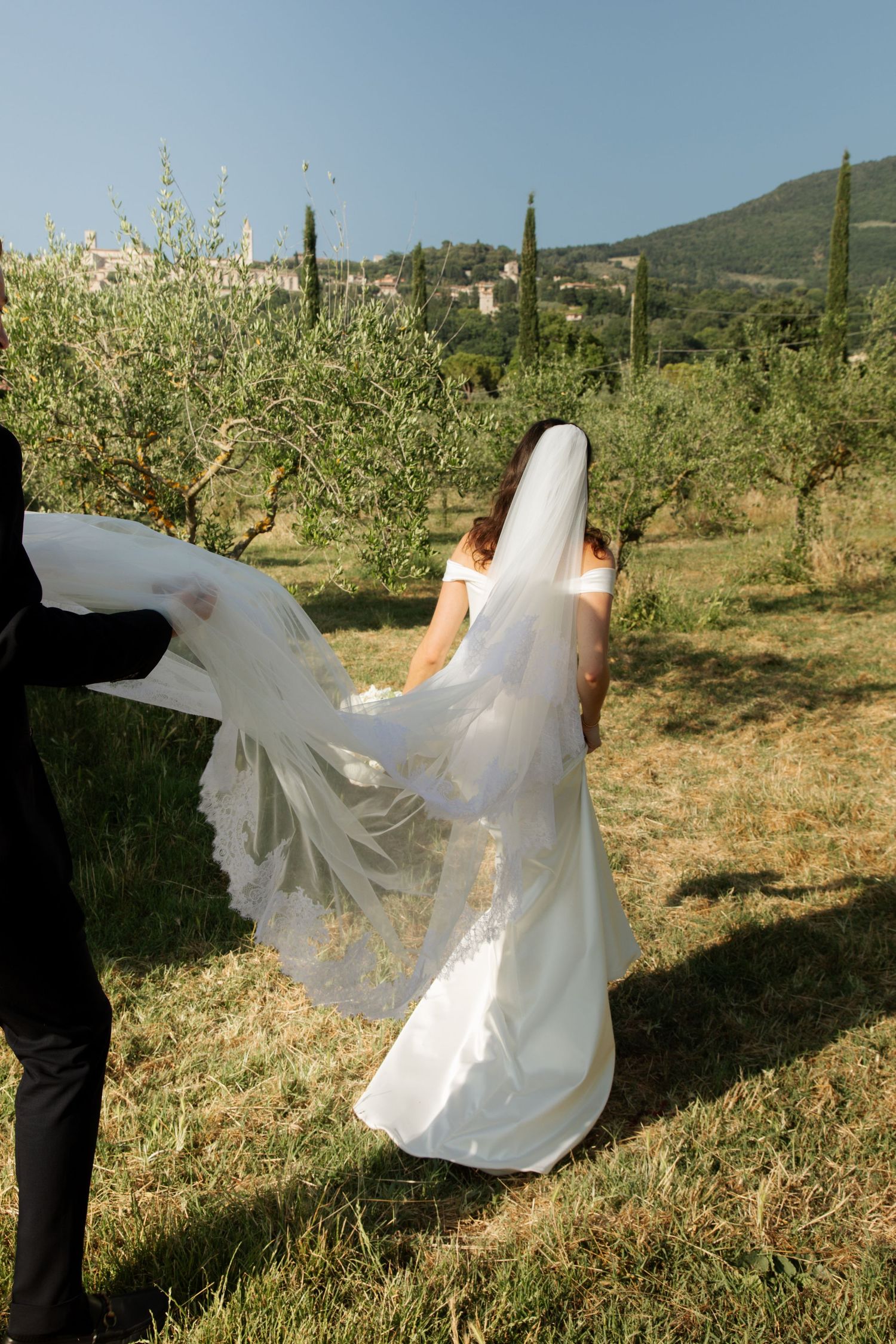 Italian Wedding photos in Assisi captured by destination wedding photographer, candid, natural style. Documentary style wedding photography.