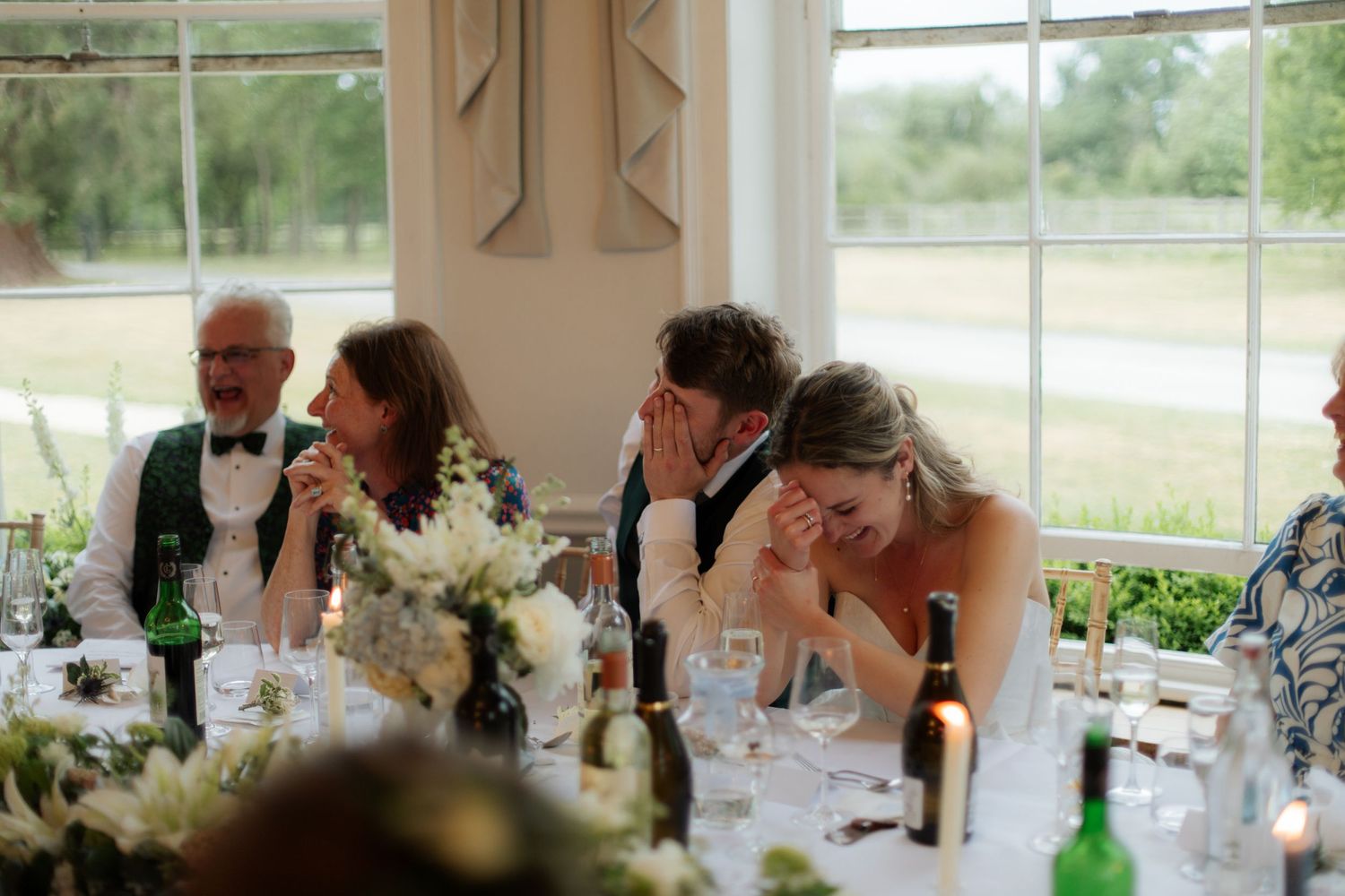 Documentary Style Cotswold Wedding Photographer captures wedding party at a Gloucestershire Wedding Venue. natural and candid wedding photos