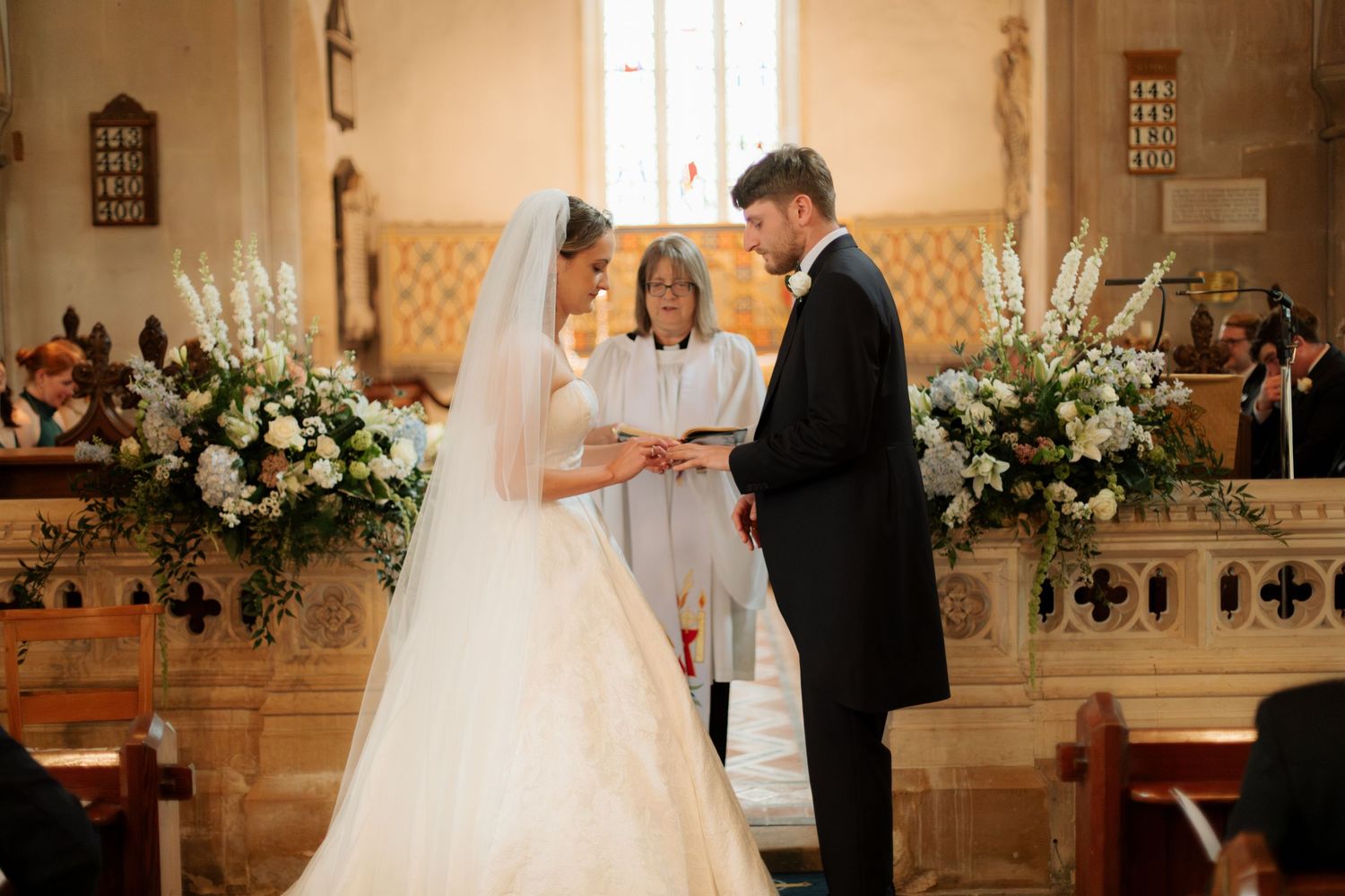 Documentary Style Cotswold Wedding Photographer captures wedding confetti at Gloucestershire Wedding Venue.Natural,candid and timeless photo