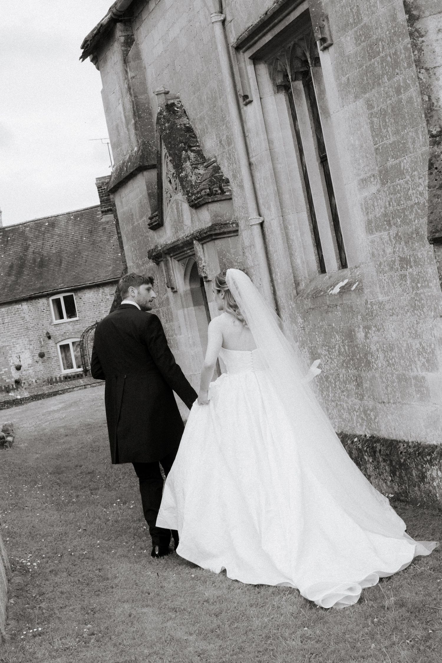 Candid Cotswold Wedding Photographer captures confetti at Gloucestershire Wedding Venue. Natural, candid and timeless photography, UK