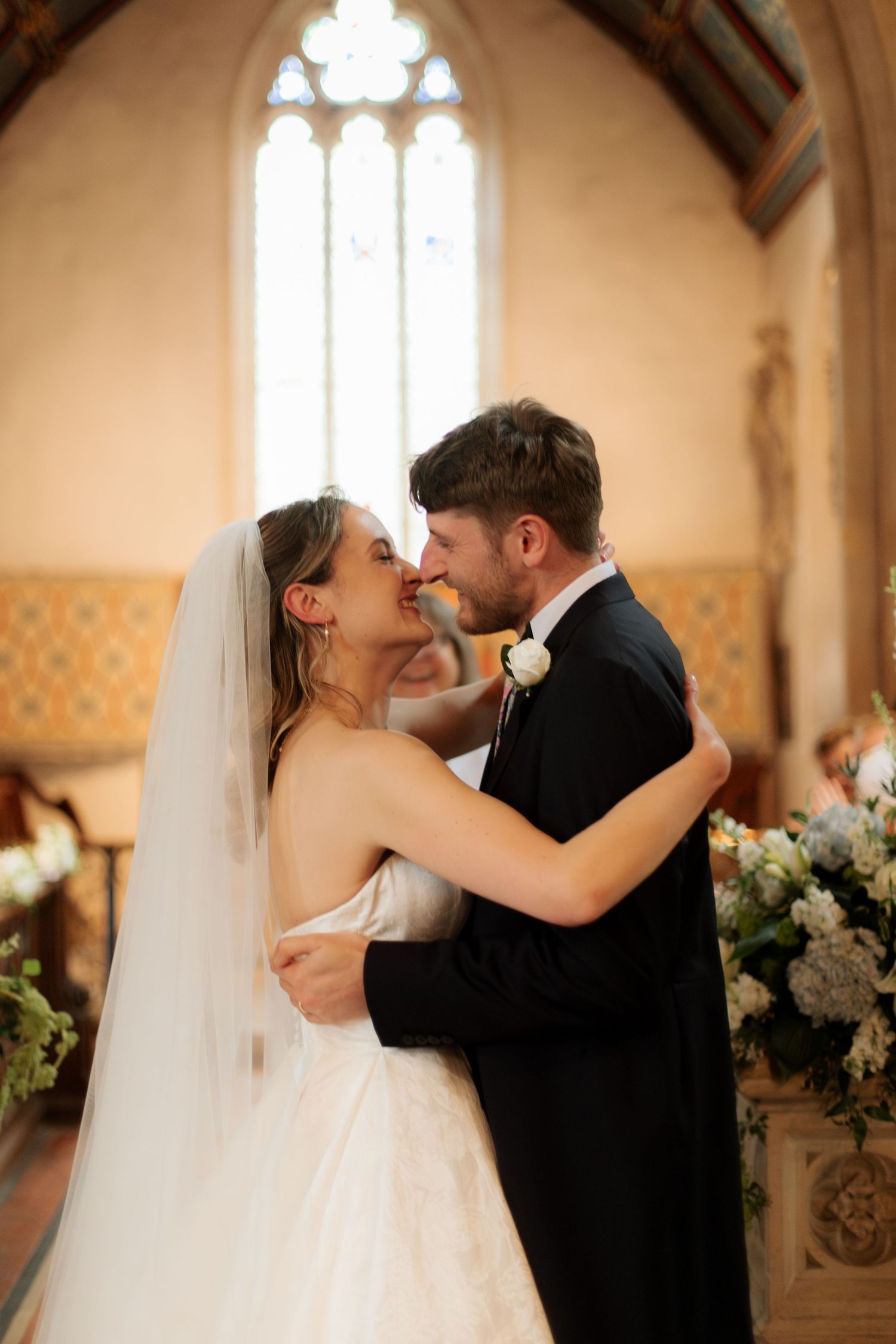 Documentary Style Cotswold Wedding Photographer captures wedding confetti at Gloucestershire Wedding Venue.Natural,candid and timeless photo