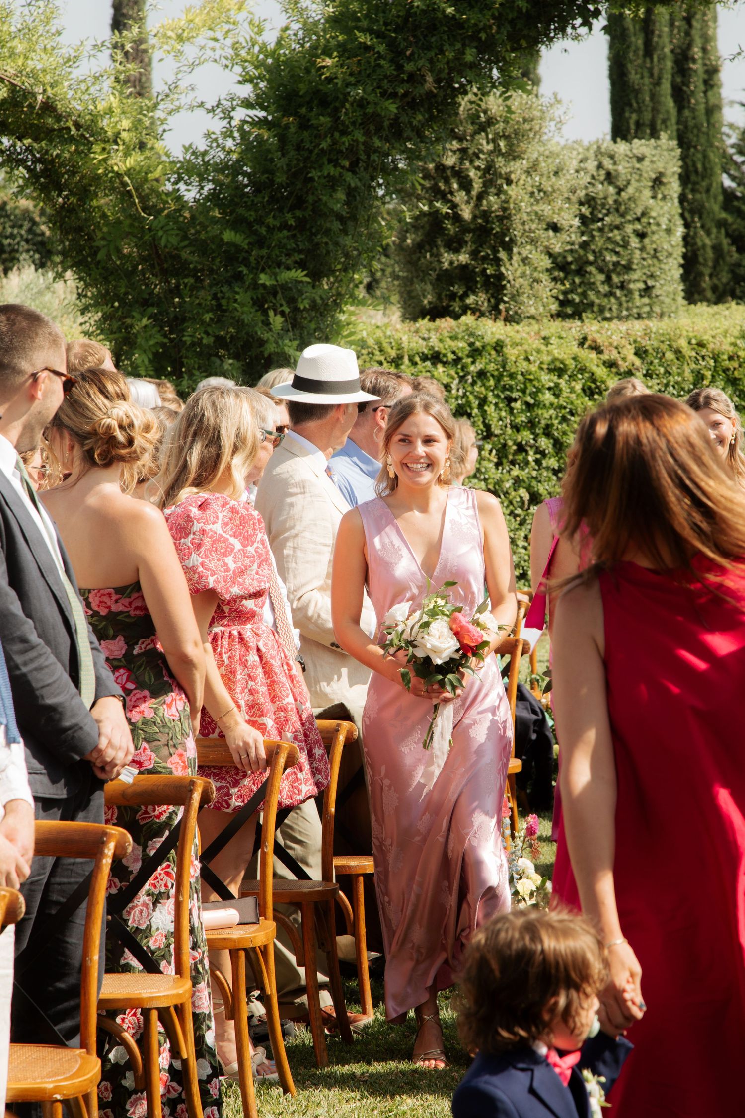 Assisi Wedding ceremony in Italy captured by destination wedding photographer, candid, natural style. Documentary style wedding photography.