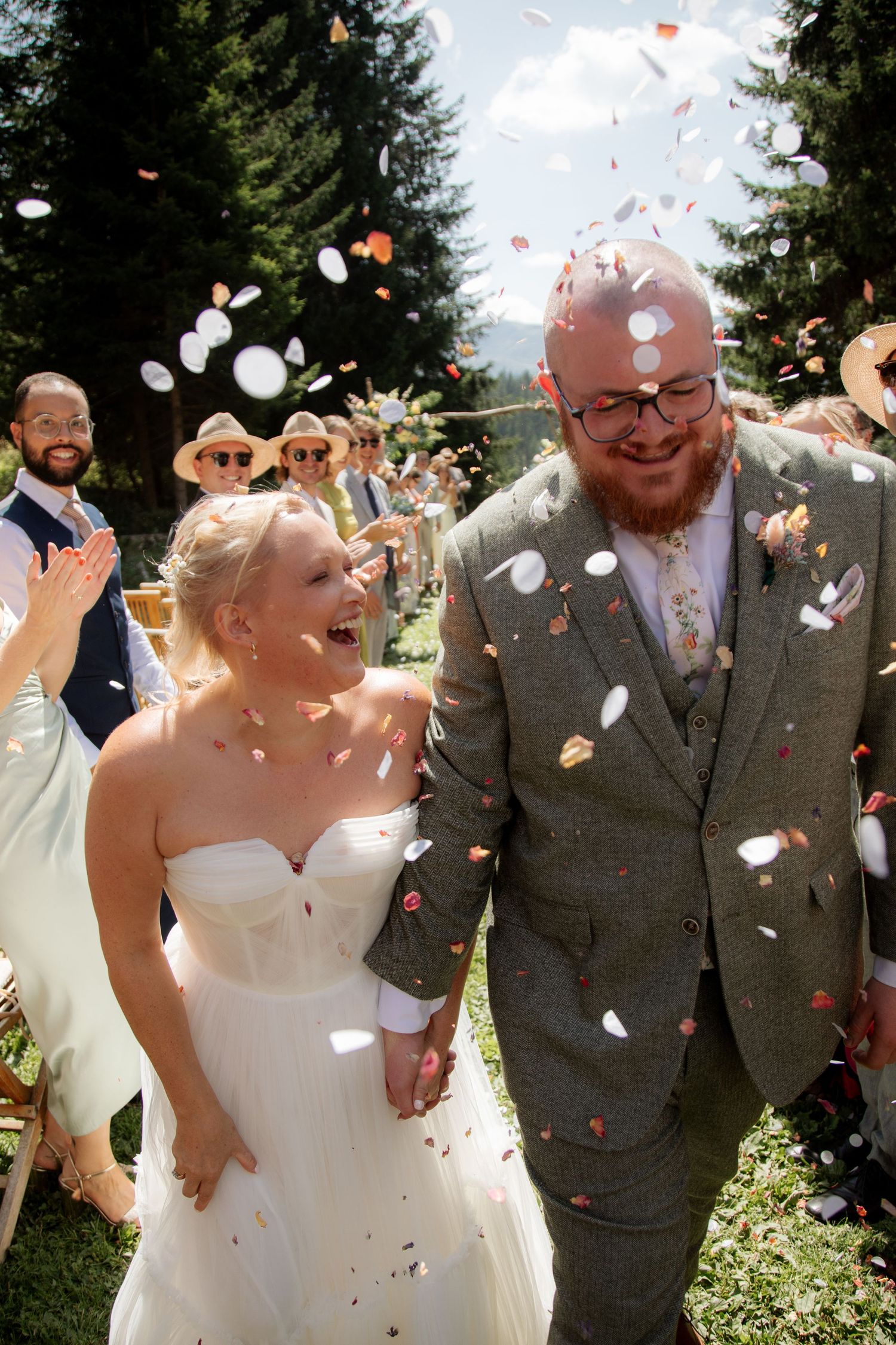 Morzine Wedding Photographer captures candid ceremony photo at Meribel Wedding venue. Natural,honest &authentic storytelling. Three Valleys