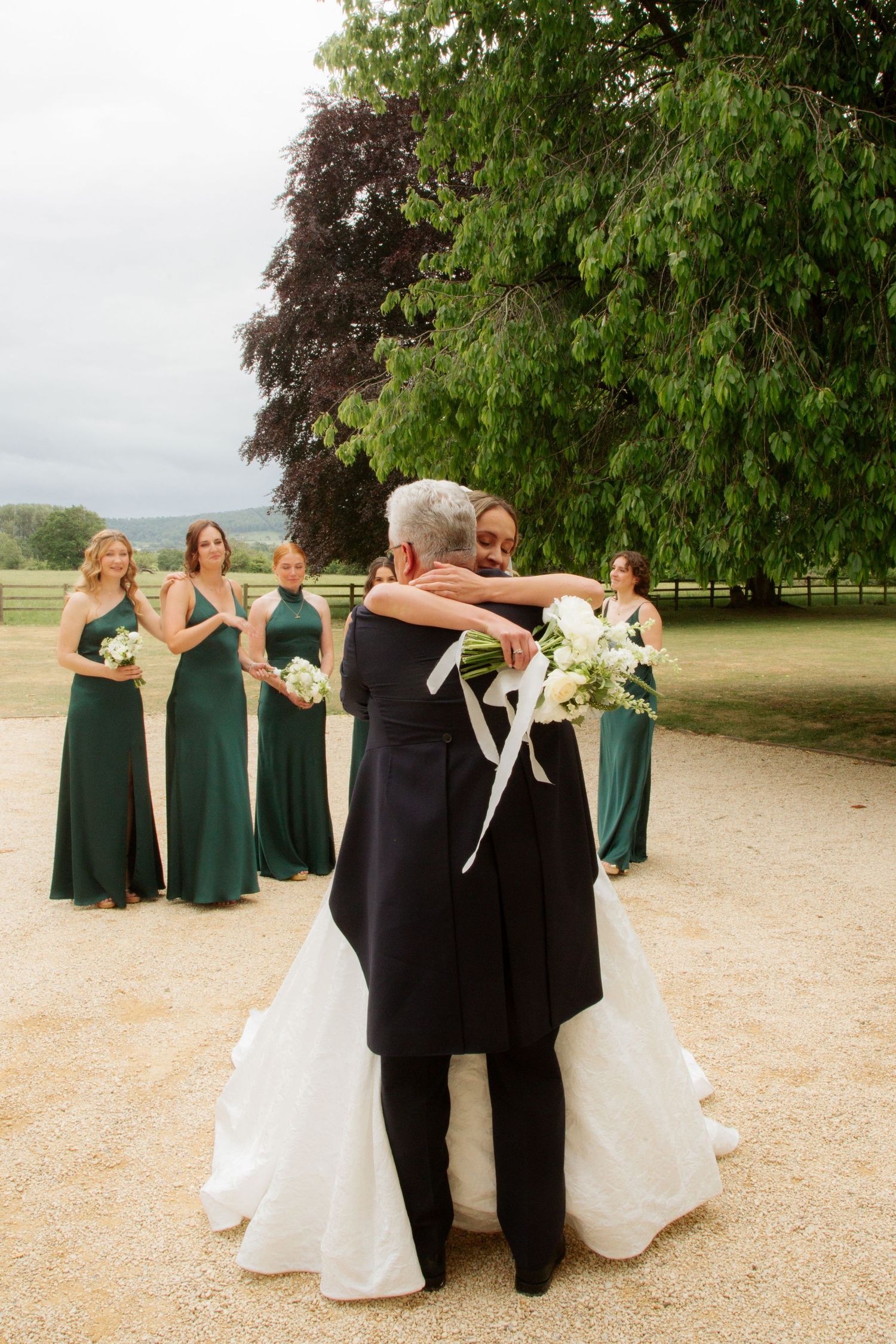 Candid Cotswold Wedding Photographer captures bridal party at Gloucestershire Wedding Venue. Natural, candid and timeless photography, UK