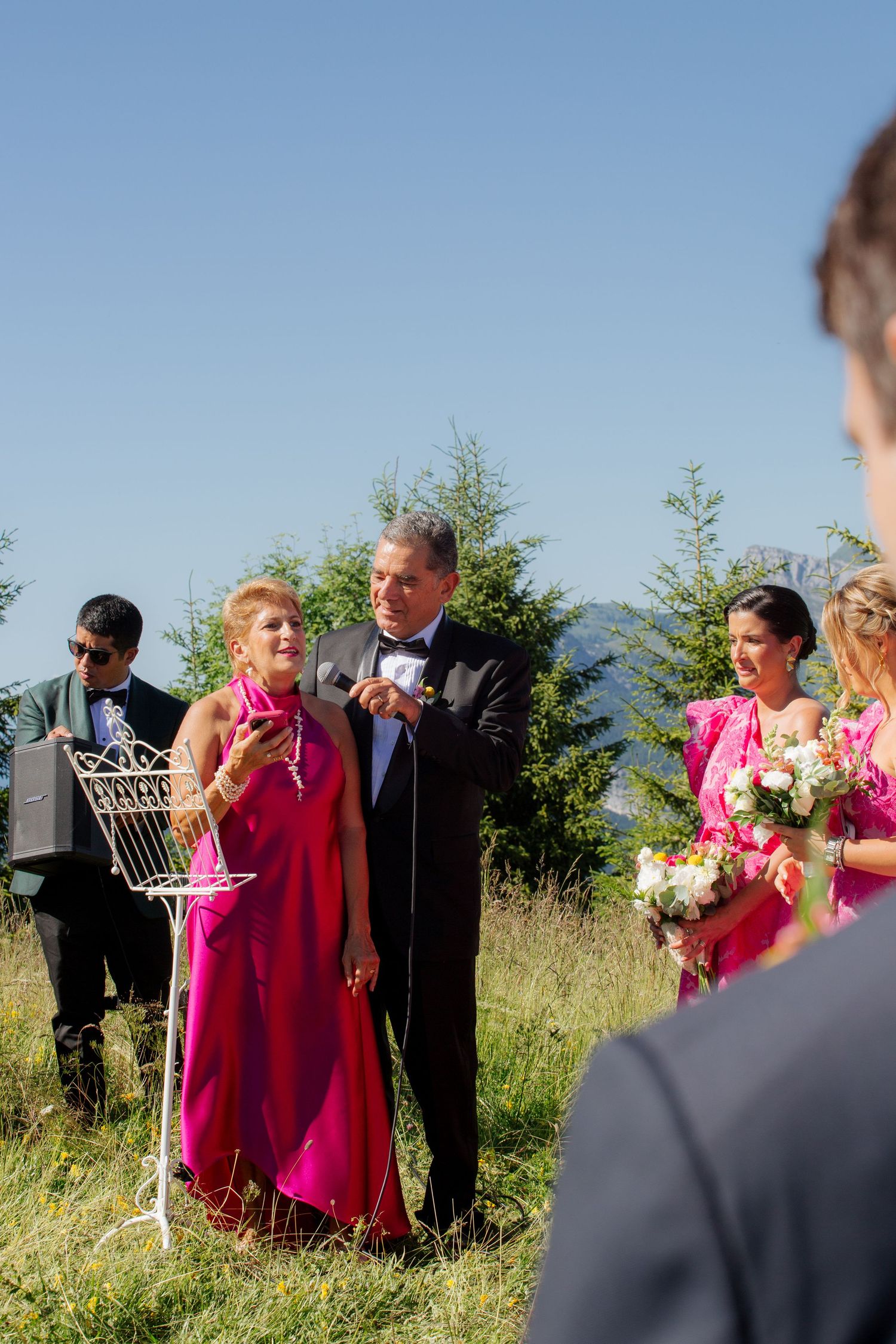 Morzine Wedding Photographer captures wedding ceremony photo at La Clusaz Wedding venue. French Mountain Wedding photographer. Outdoor Bride