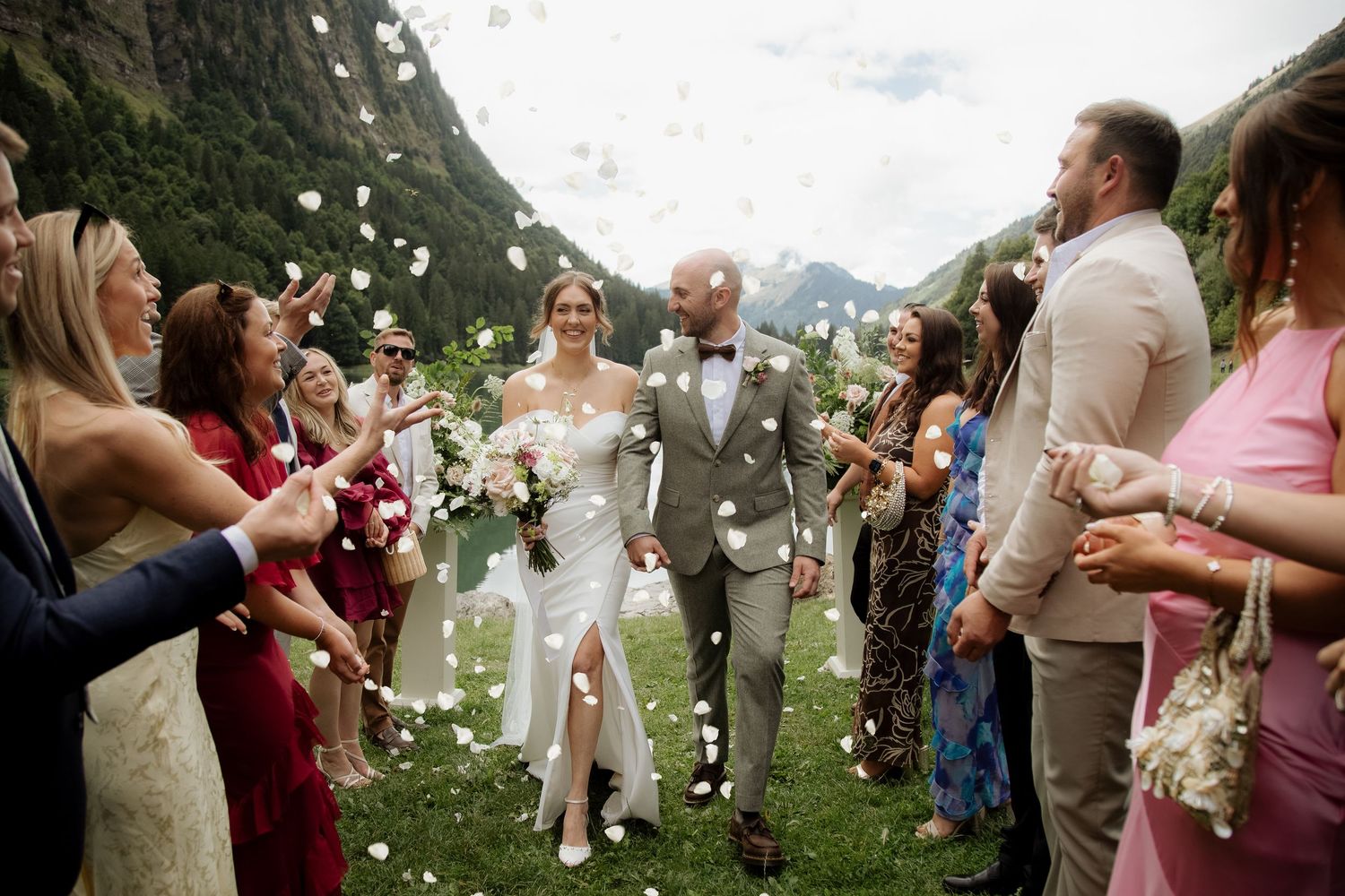 Morzine Wedding photographer captures epic wedding photos with Mountains & Lake Montriond backdrop. Candid timeless documentary style photos