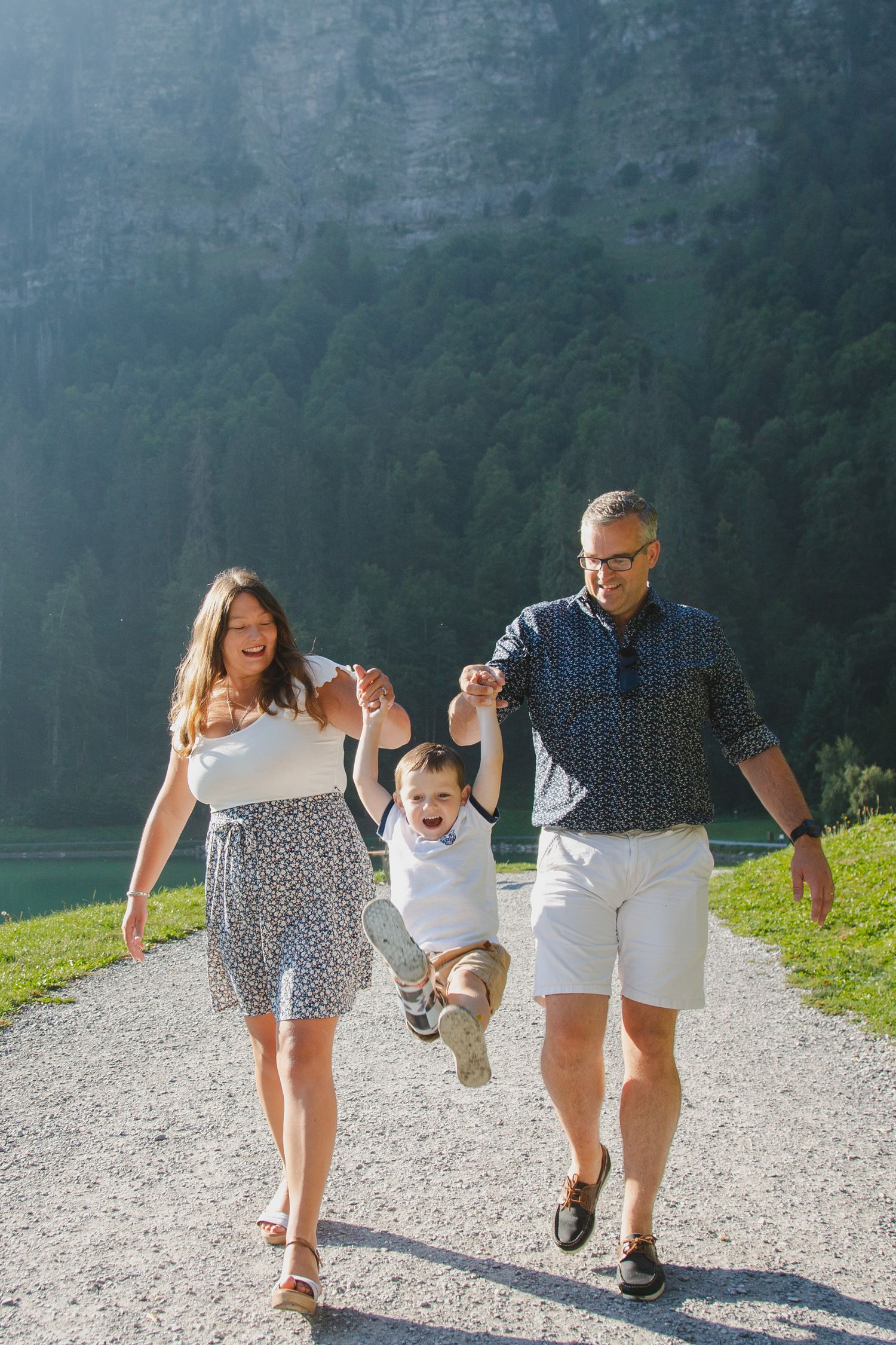 Outdoor family photography session next to Lake Montriond. Captured by Morzine Family photographer. Natural family portraits in morzine