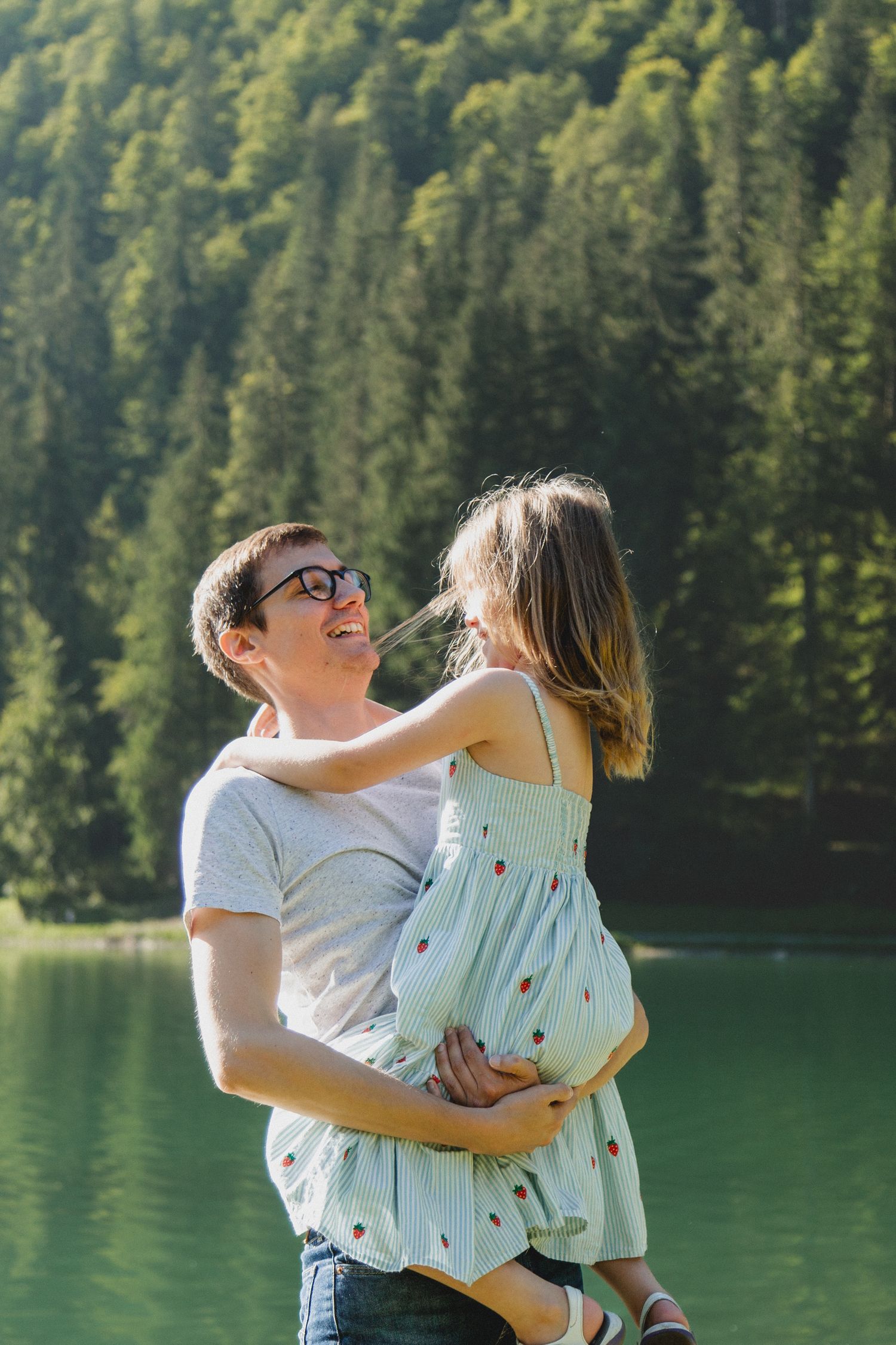Family Photographer captures outdoor family photos. Family photography session captured by Morzine family Photographer at Lac Montriond