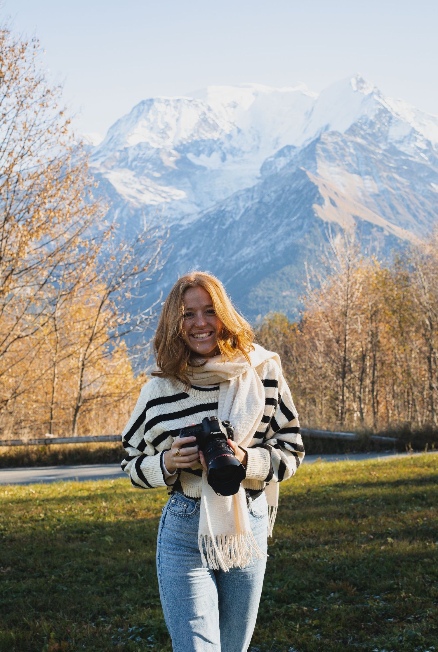 Morzine Wedding Photographer headshots with camera. Wedding photogrpaher covering the UK, French Alps, and europe.