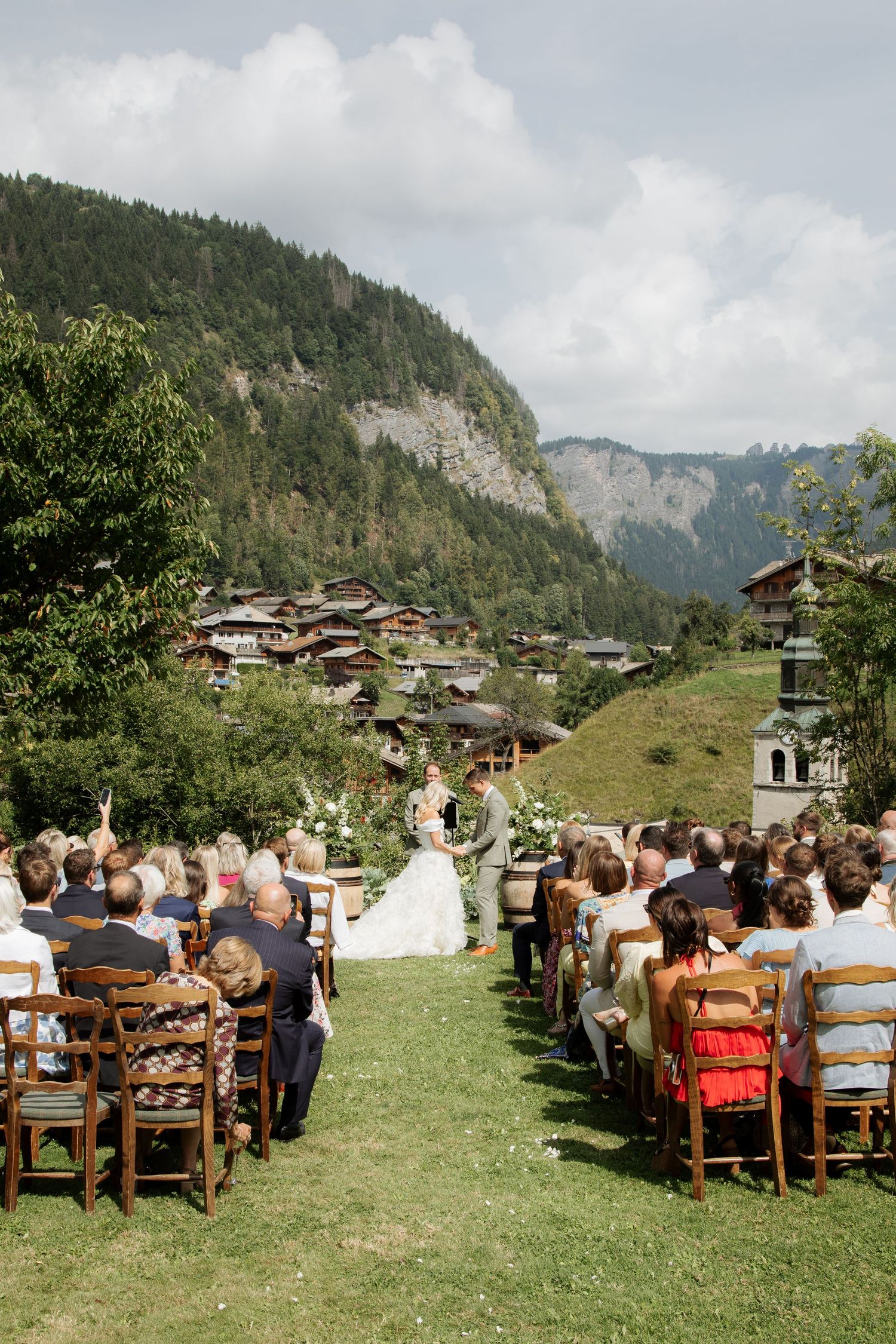 Documentary style Wedding Photographer captures wedding photos at Morzine Wedding venue. Natural, timeless and candid wedding photography.