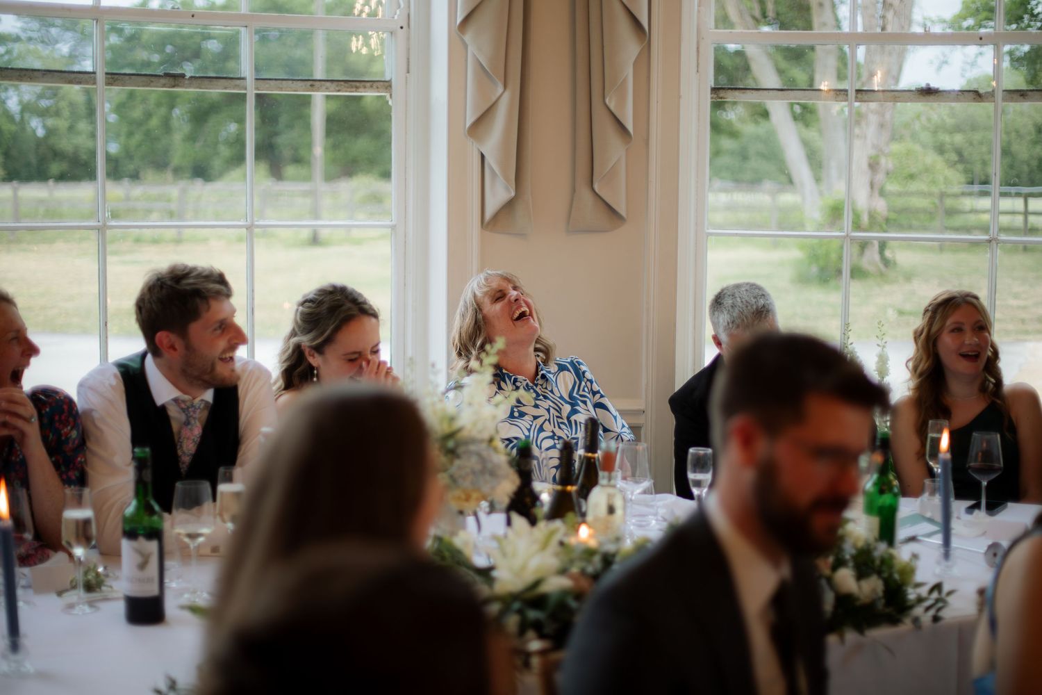 Documentary Style Cotswold Wedding Photographer captures wedding party at a Gloucestershire Wedding Venue. natural and candid wedding photos