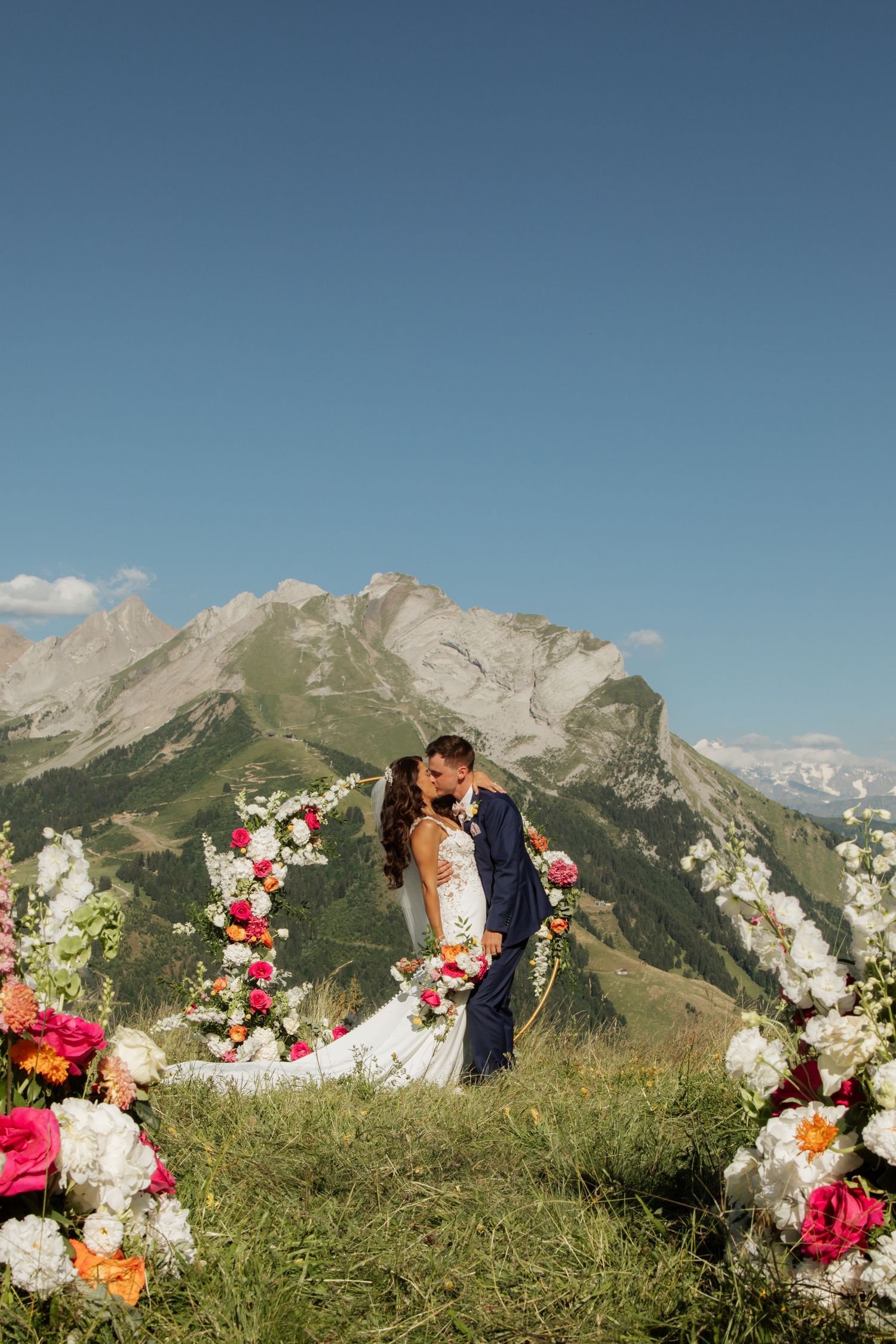 Morzine Wedding Photographer captures bride and groom photos in La Clusaz Wedding venue. French Mountain Wedding photographer. Outdoor Bride