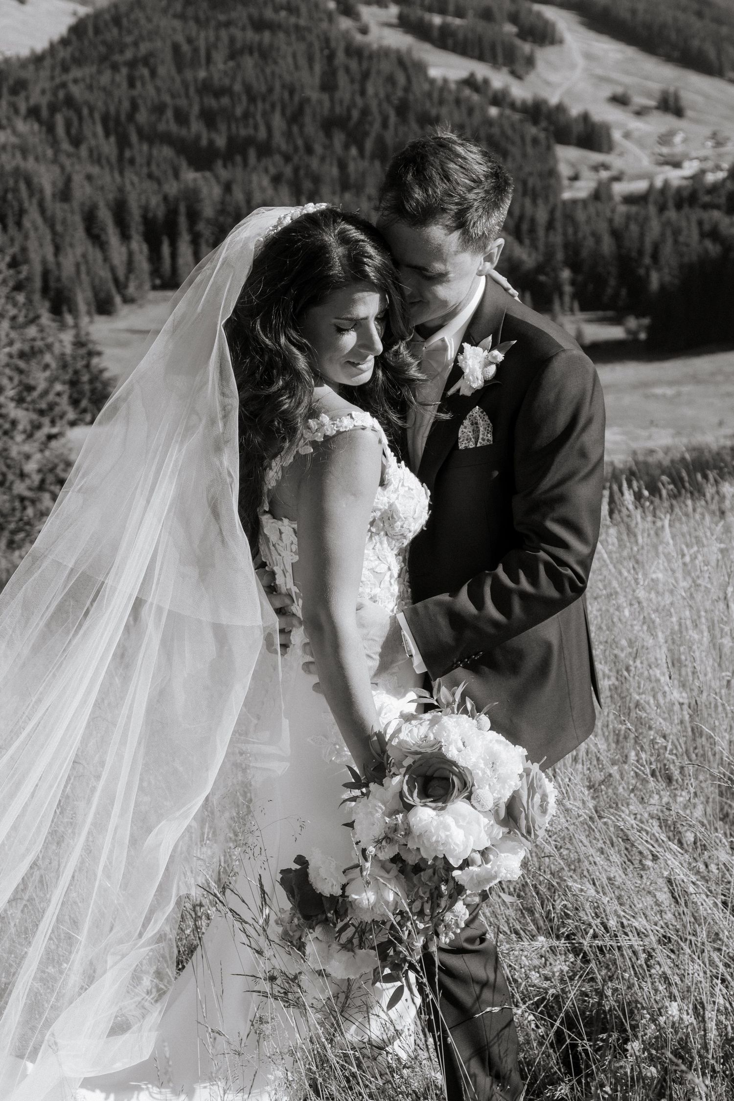Morzine Wedding Photographer captures bride and groom photos in La Clusaz Wedding venue. French Mountain Wedding photographer. Outdoor Bride