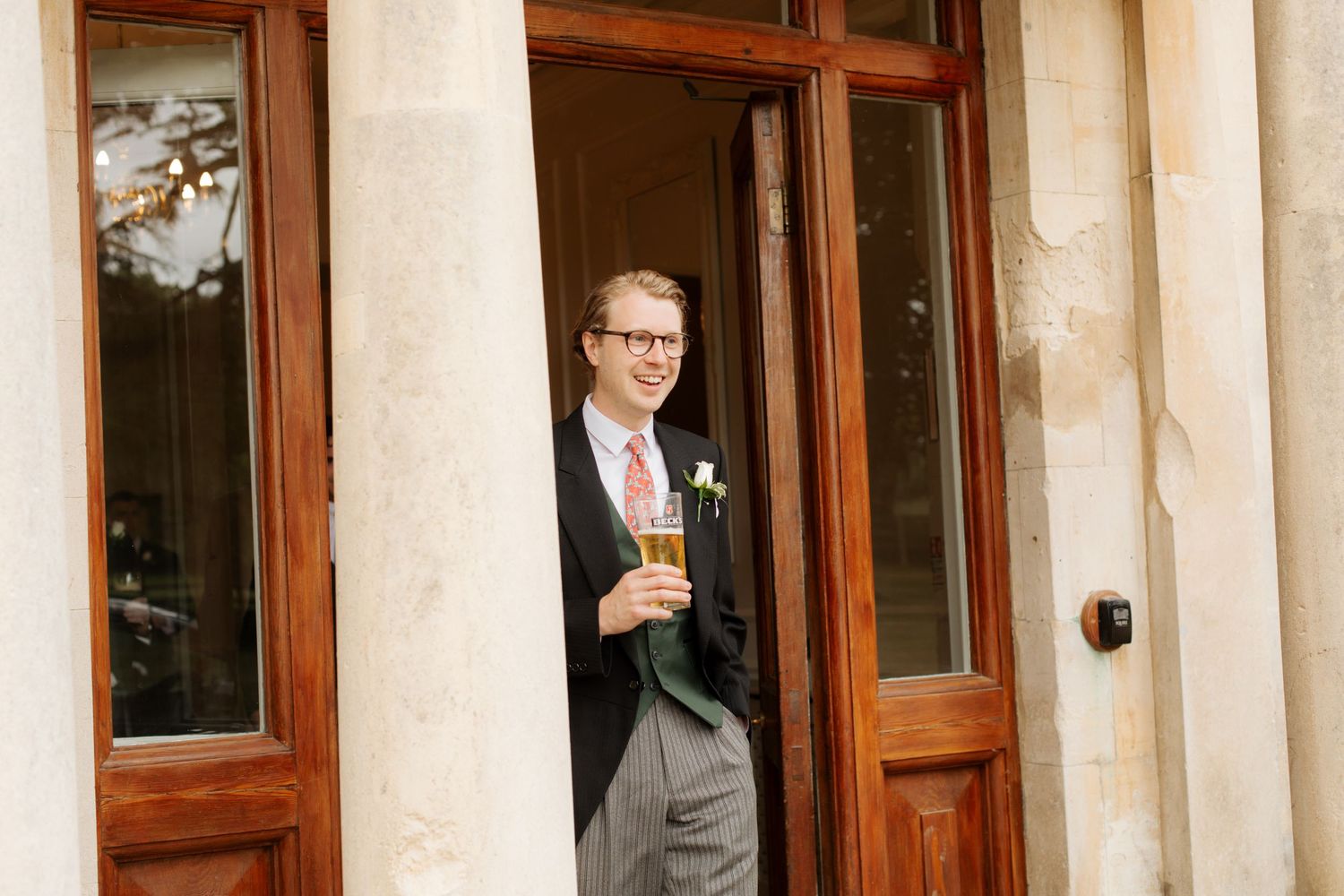 Documentary Style Cotswold Wedding Photographer captures groomsmen at Gloucestershire Wedding Venue.Natural,candid and timeless photography