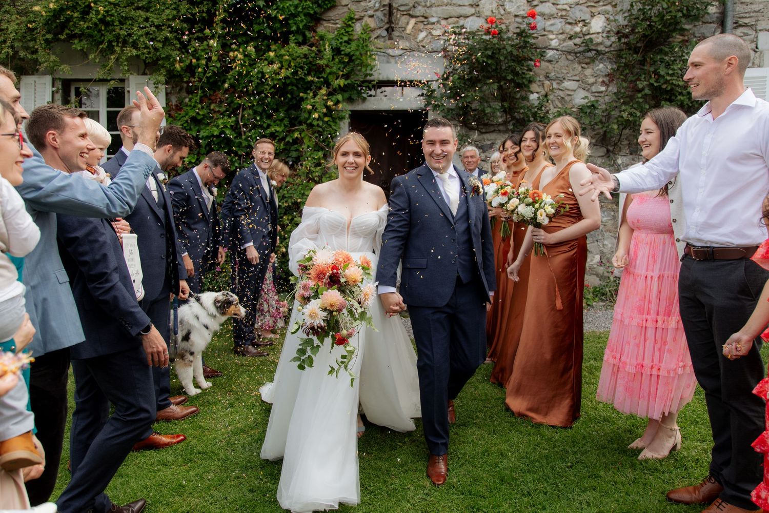 Morzine Wedding photographer captures epic confettie and real emotions in Morzine Wedding Venue. Candid,timeless documentary style photos