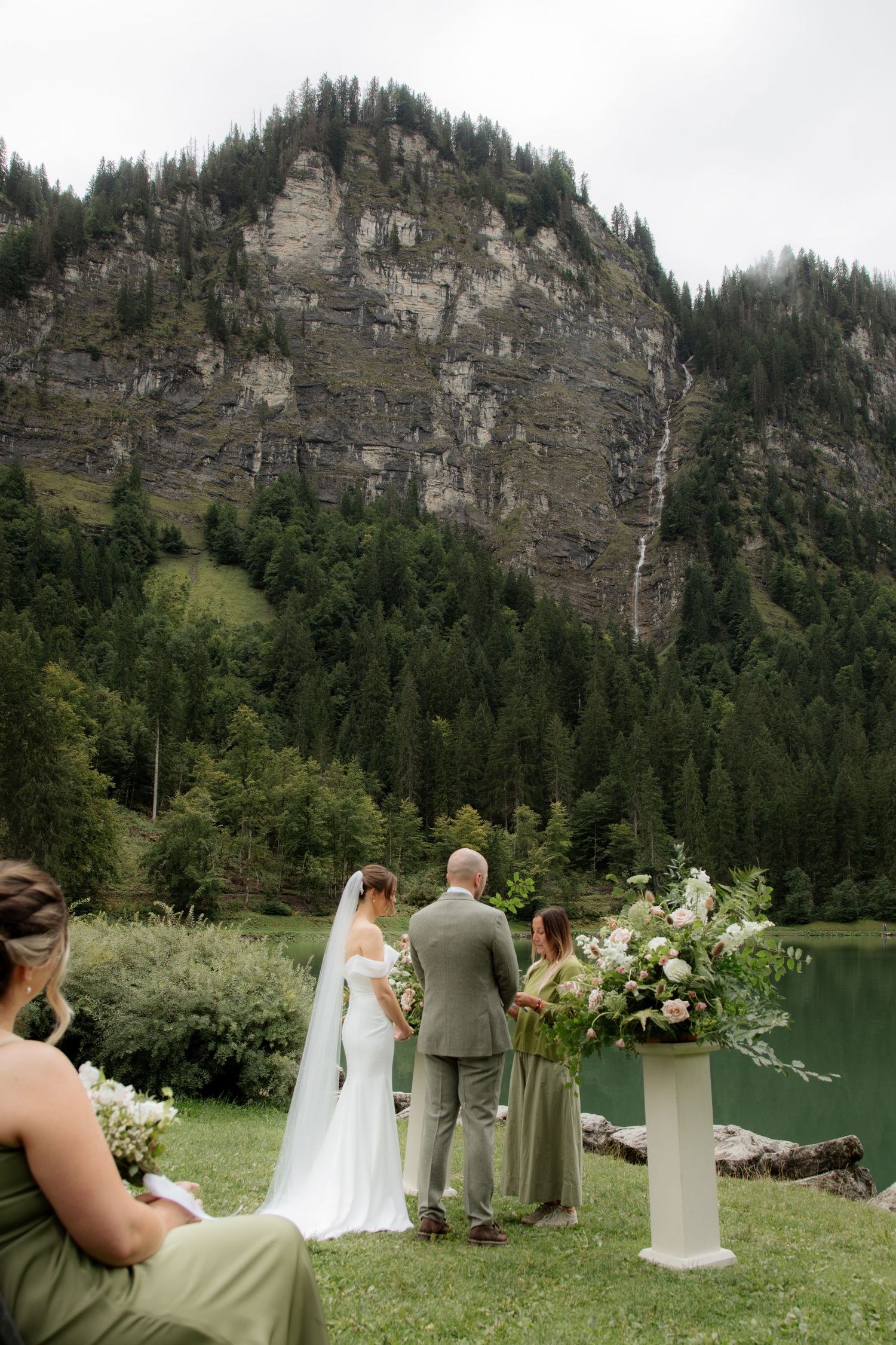 Morzine Wedding photographer captures outdoor wedding cermeony photo on Lac Montriond. Candid timeless documentary style photography.