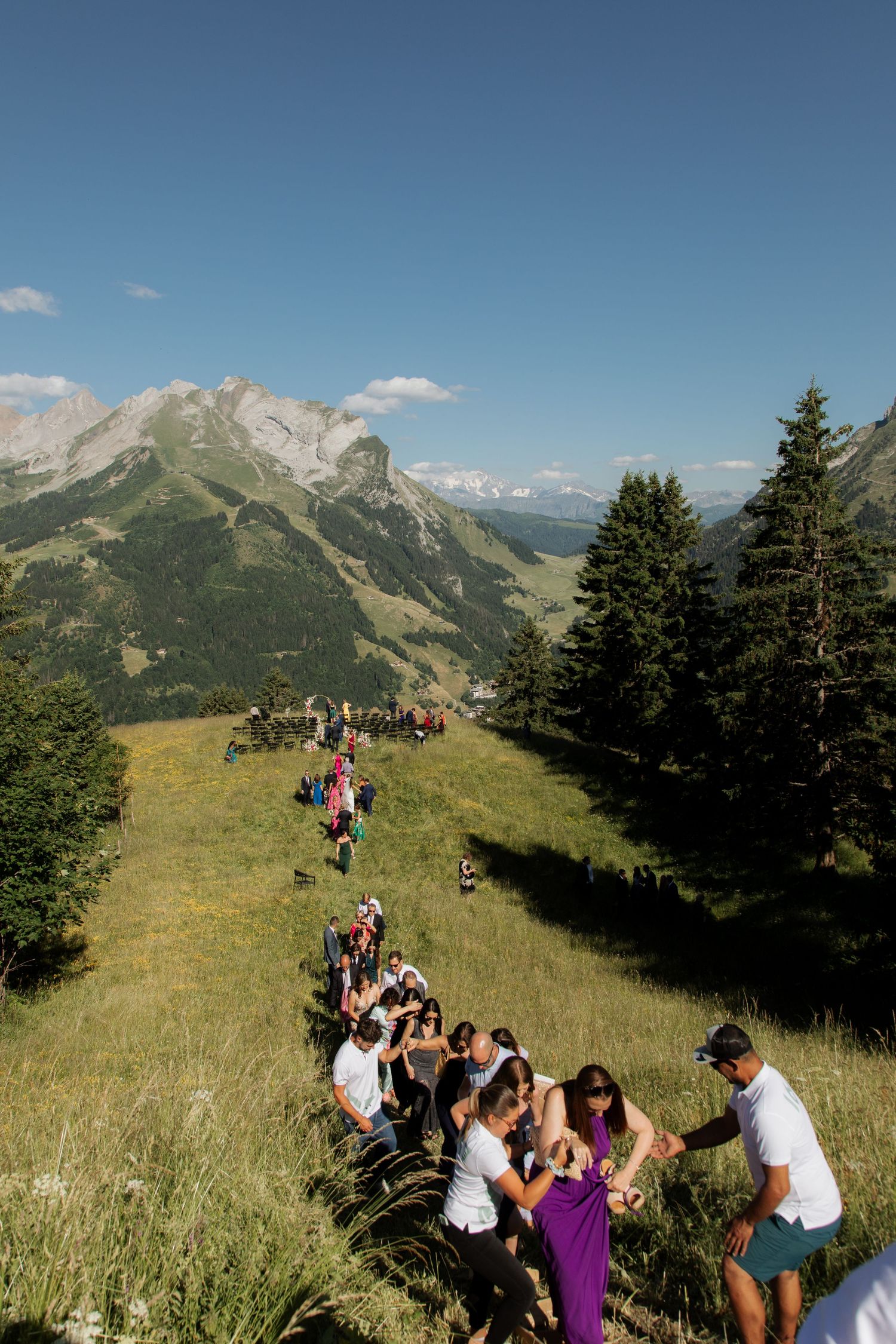 Morzine Wedding Photographer captures wedding ceremony photo at La Clusaz Wedding venue. French Mountain Wedding photographer. Outdoor Bride