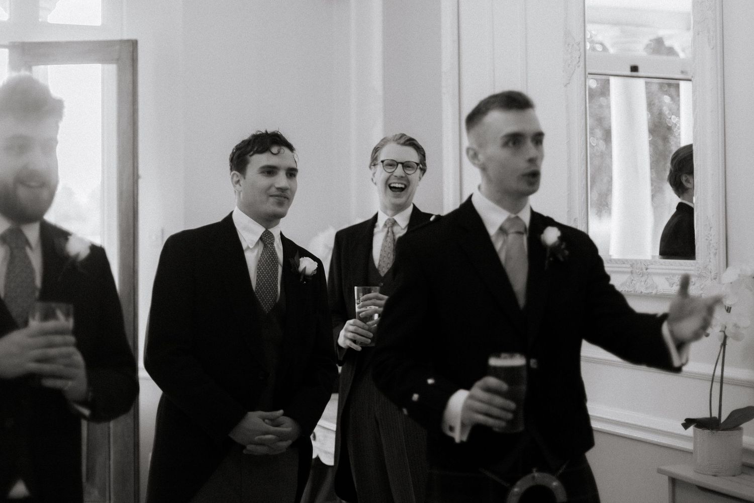 Documentary Style Cotswold Wedding Photographer captures groomsmen at Gloucestershire Wedding Venue.Natural,candid and timeless photography
