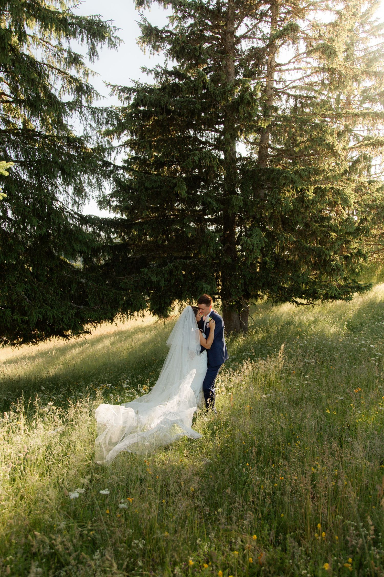 French Wedding Photographer cpatures stunning golden hour couples photo at La Clusaz Wedding Venue. Natural, honest & authentic storytelling