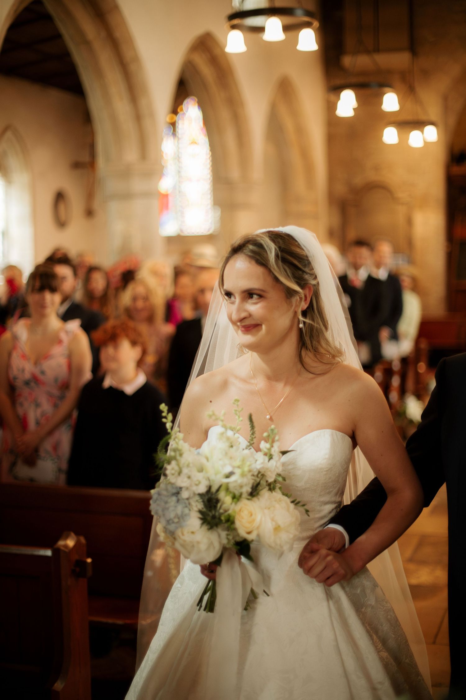 Documentary Style Cotswold Wedding Photographer captures wedding confetti at Gloucestershire Wedding Venue.Natural,candid and timeless photo