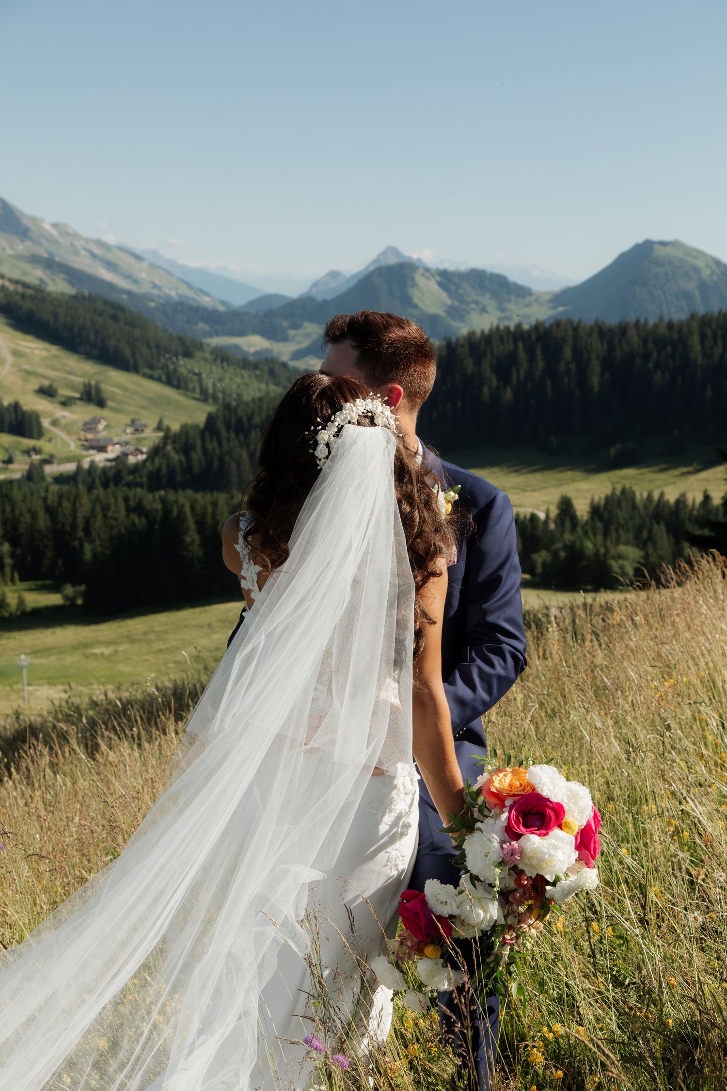 Morzine Wedding Photographer captures bride and groom photos in La Clusaz Wedding venue. French Mountain Wedding photographer. Outdoor Bride