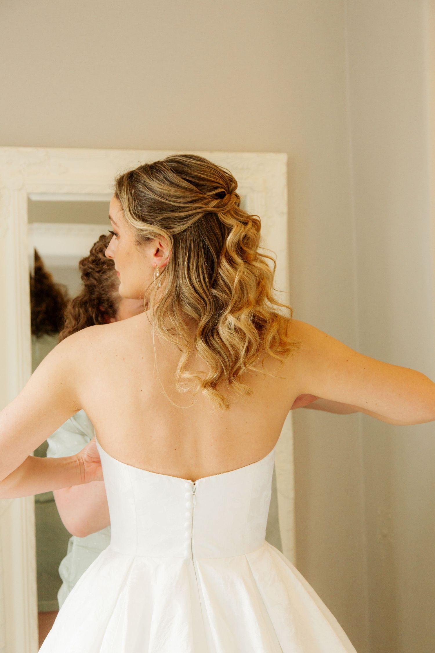 Candid Cotswold Wedding Photographer captures the bride in a  Gloucestershire Wedding Venue. Natural, candid and timeless photography, UK