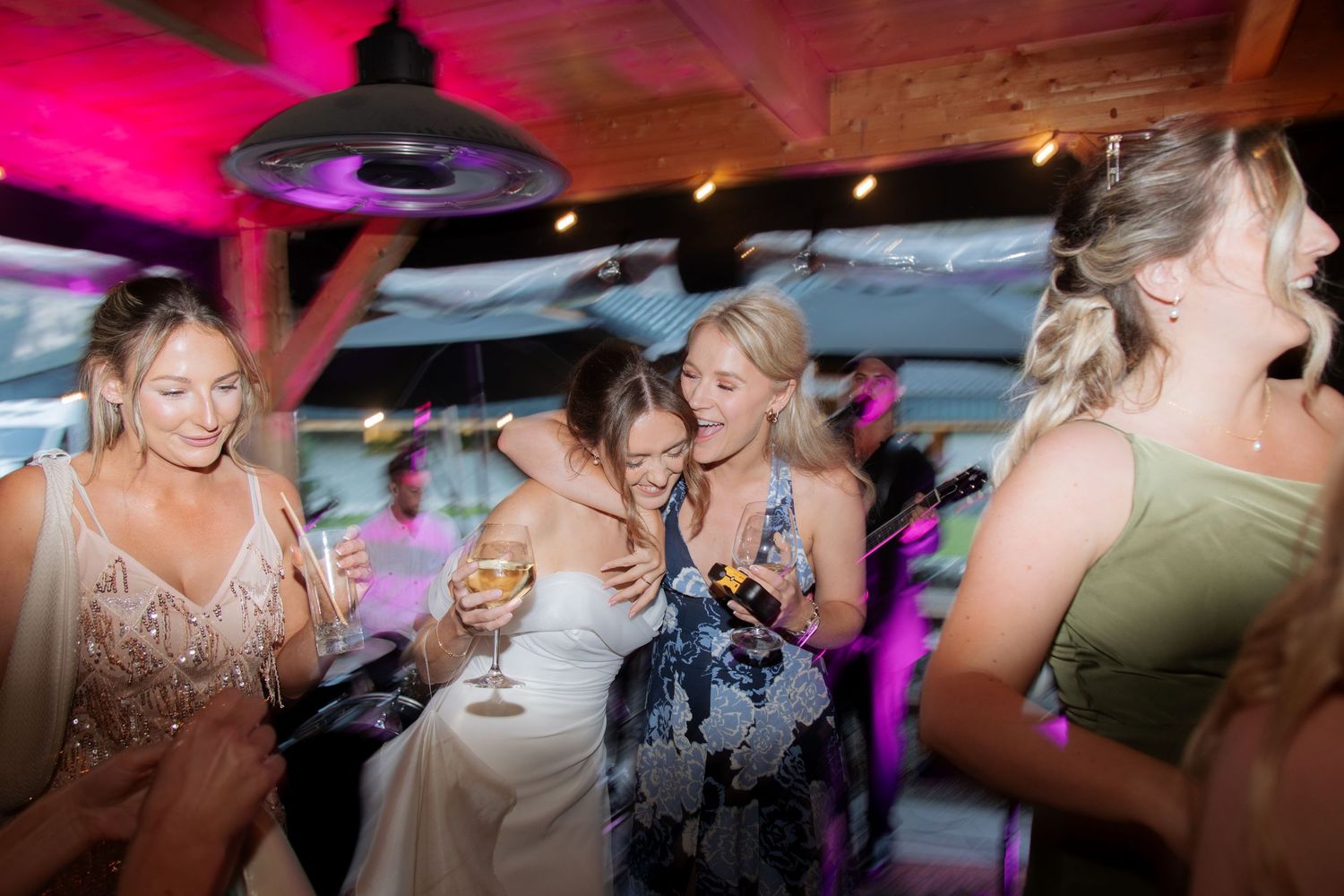 Morzine Wedding photographer captures flash photos of wedding party at Montriond Wedding Venue, Lake Montriond.Candid timeless documentary