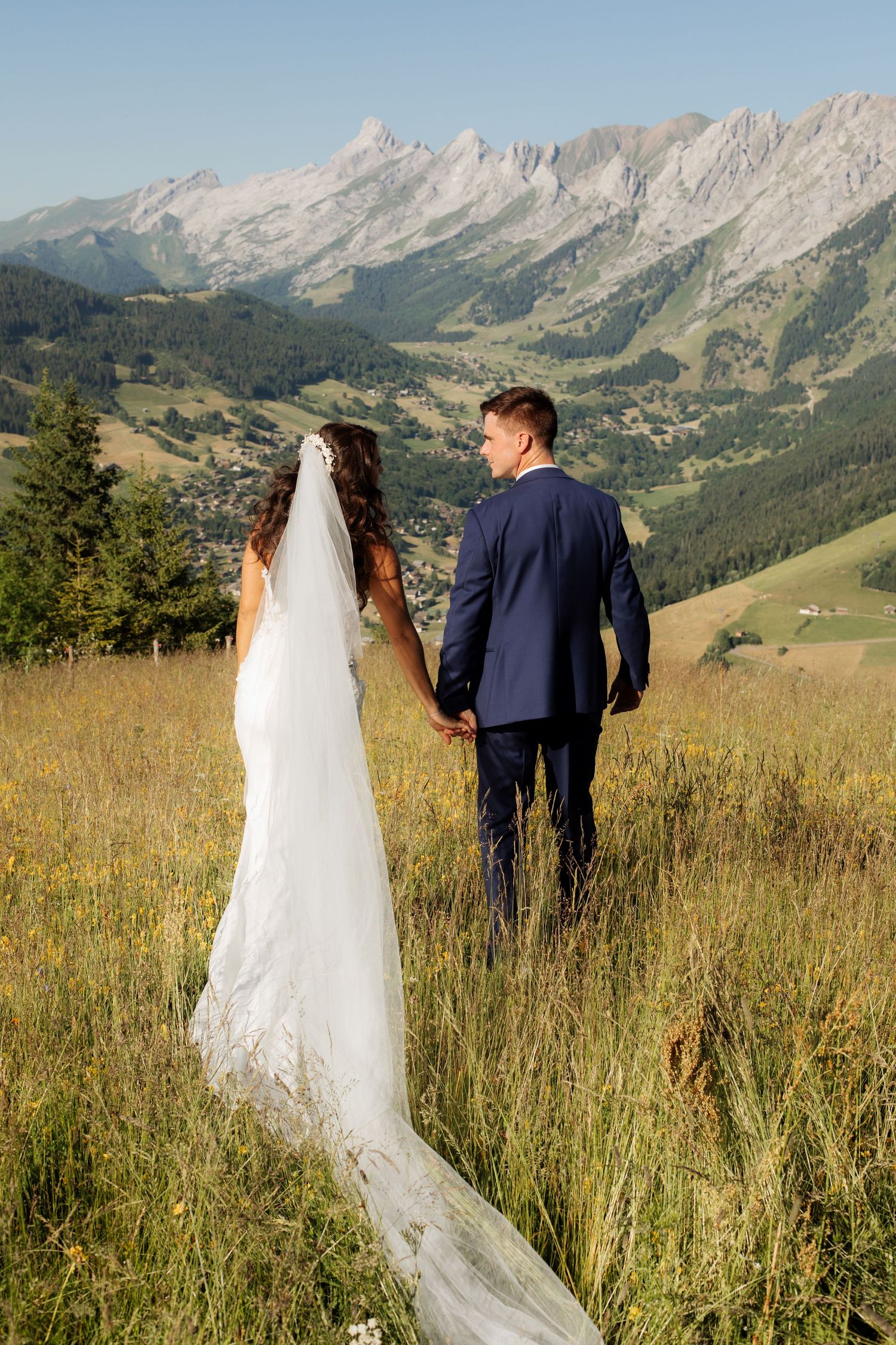 Morzine Wedding Photographer captures bride and groom photos in La Clusaz Wedding venue. French Mountain Wedding photographer. Outdoor Bride