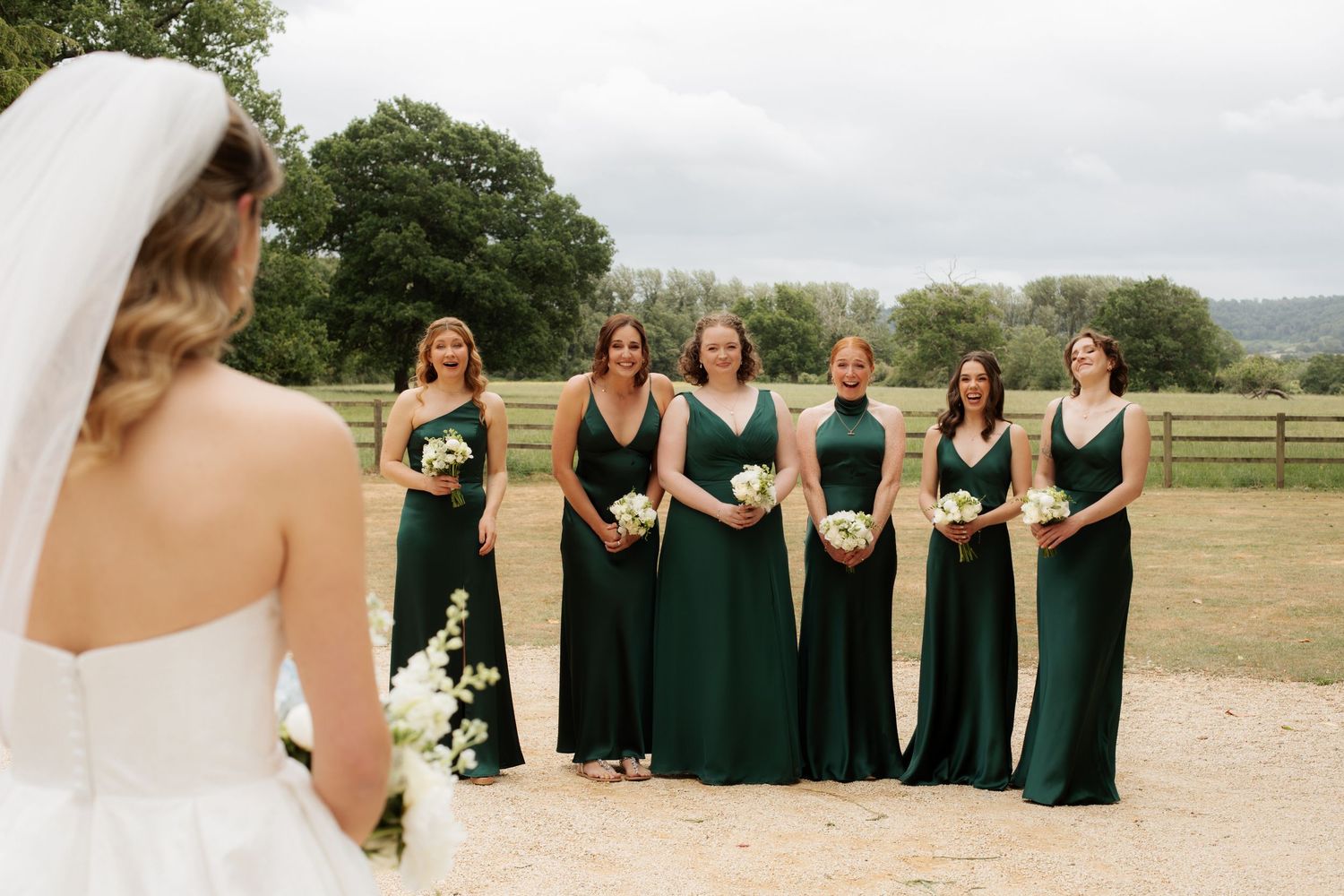 Candid Cotswold Wedding Photographer captures bridal party at Gloucestershire Wedding Venue. Natural, candid and timeless photography, UK