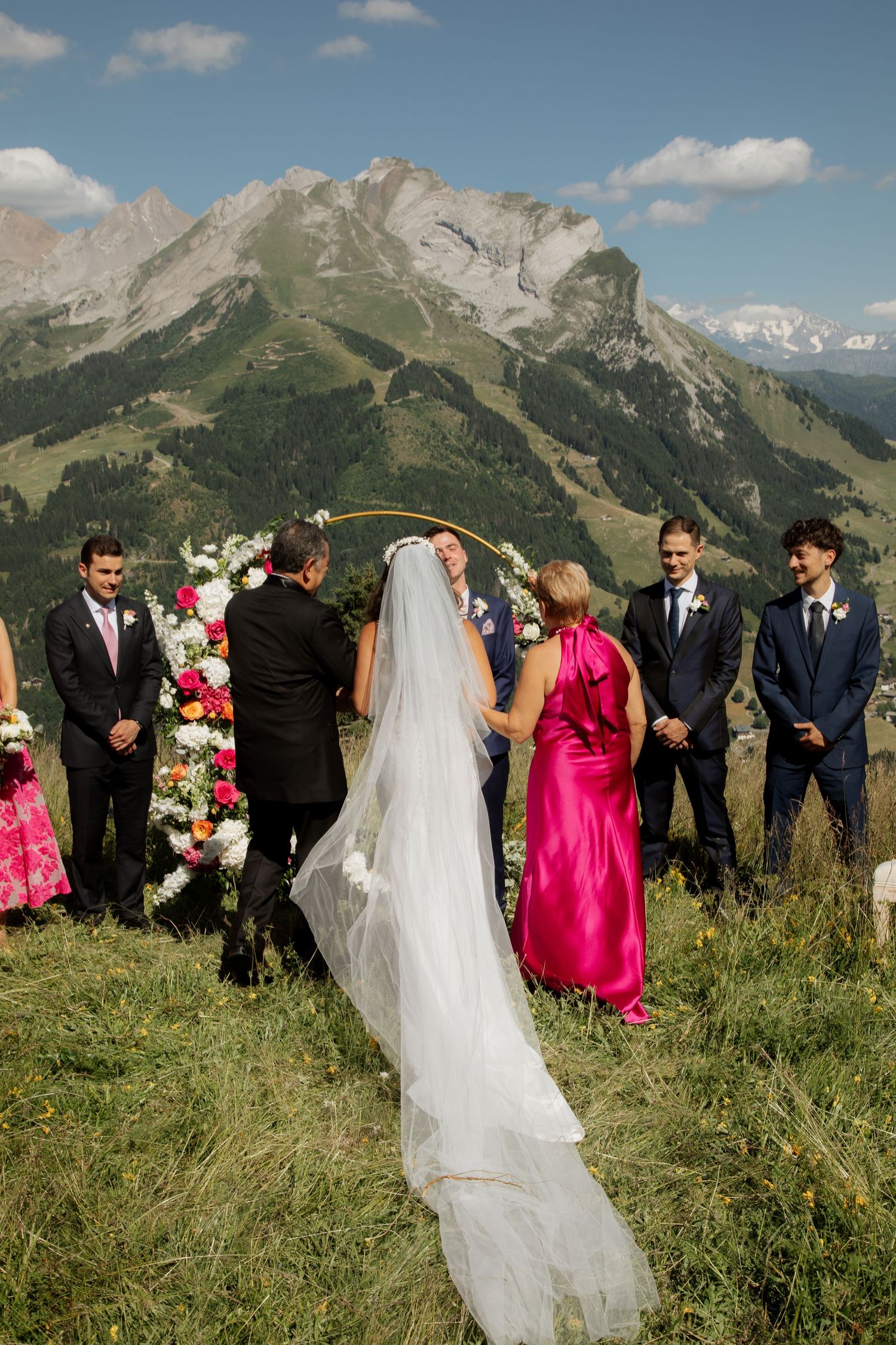 European Wedding Photographer captures emotional wedding at La Clusaz Wedding venue. French Alps Mountain Wedding photographer.Outdoor Bride