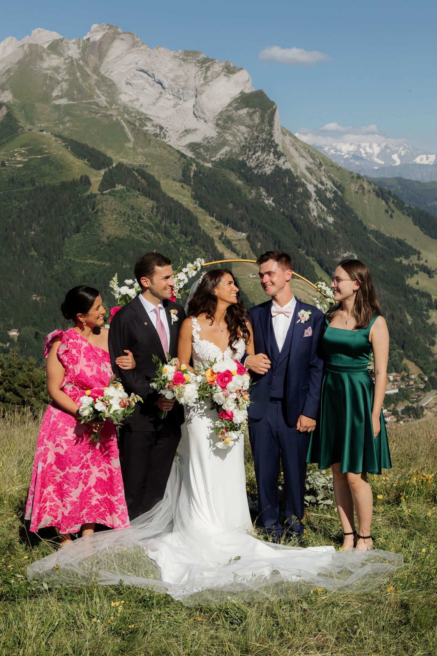Morzine Wedding Photographer captures wedding ceremony photo at La Clusaz Wedding venue. French Mountain Wedding photographer. Outdoor Bride