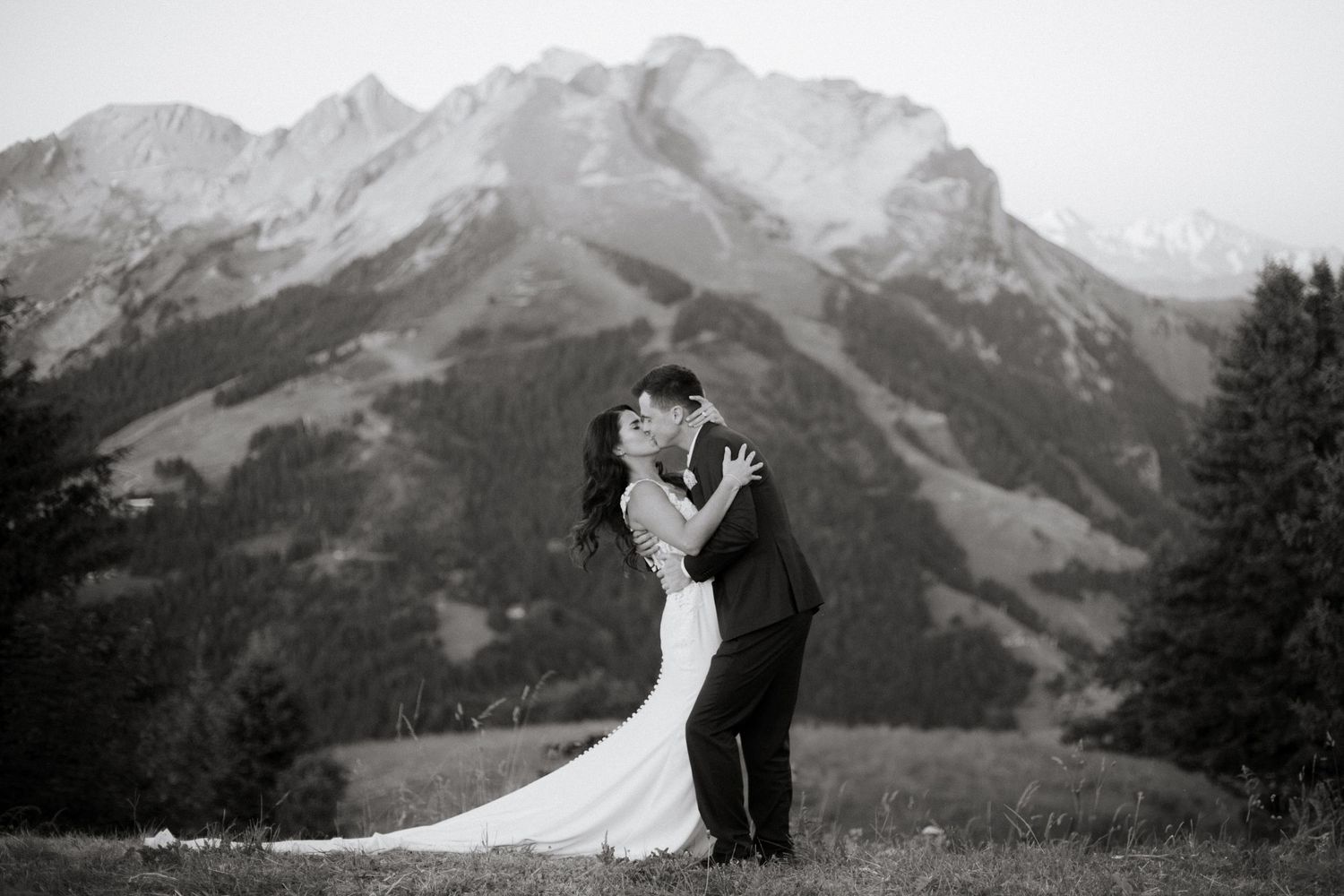 Morzine Wedding Photographer captures bride and groom photos in La Clusaz Wedding venue. French Mountain Wedding photographer. Outdoor Bride