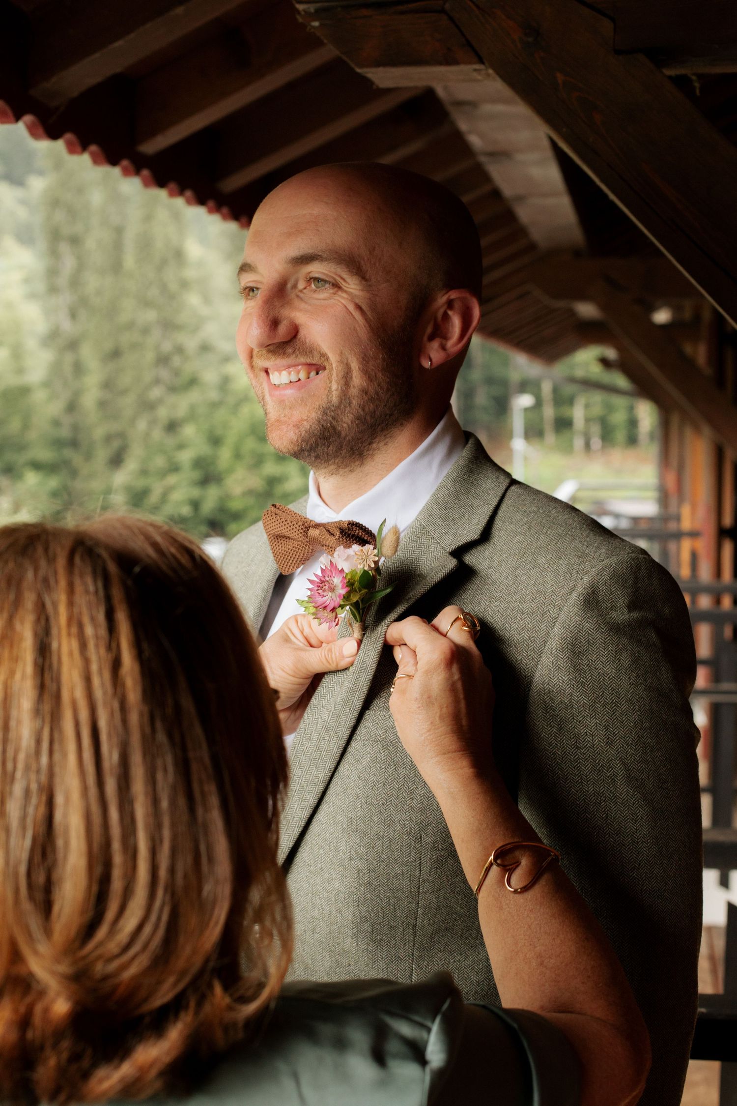 Morzine Wedding photographer captures intimate wedding morning details on Lake Montriond. Candid timeless documentary style photography.