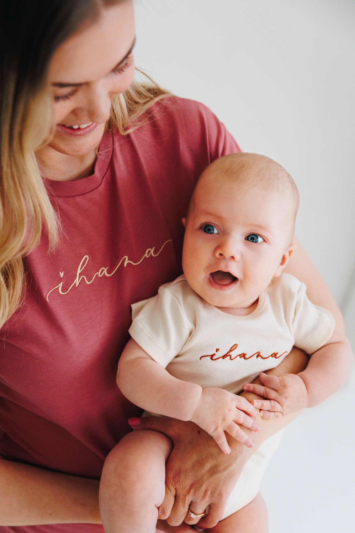 Mother and baby wearing matching 